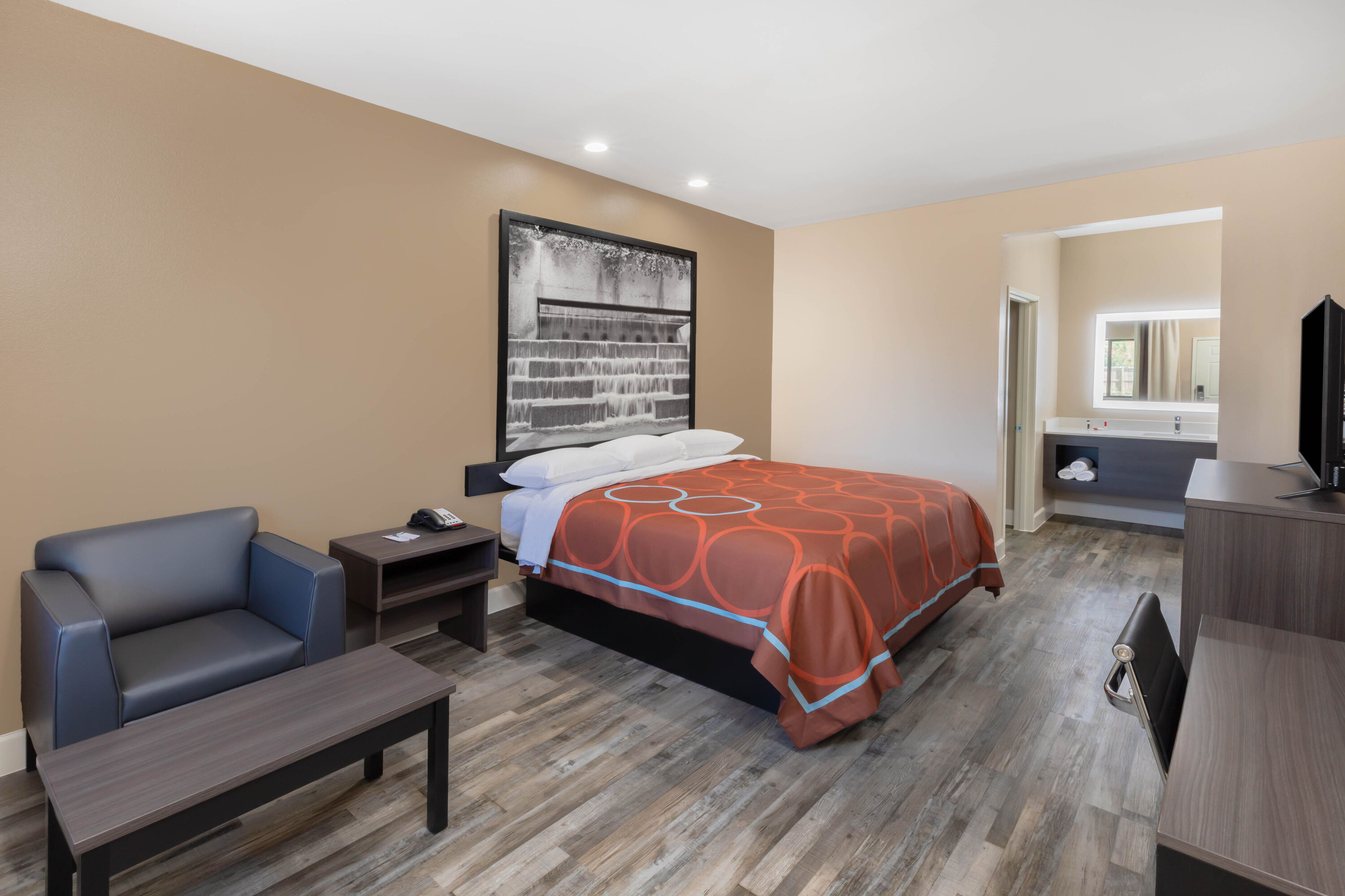 Guest room at the Super 8 by Wyndham Houston NW Beltway 8/West Rd in Houston, Texas