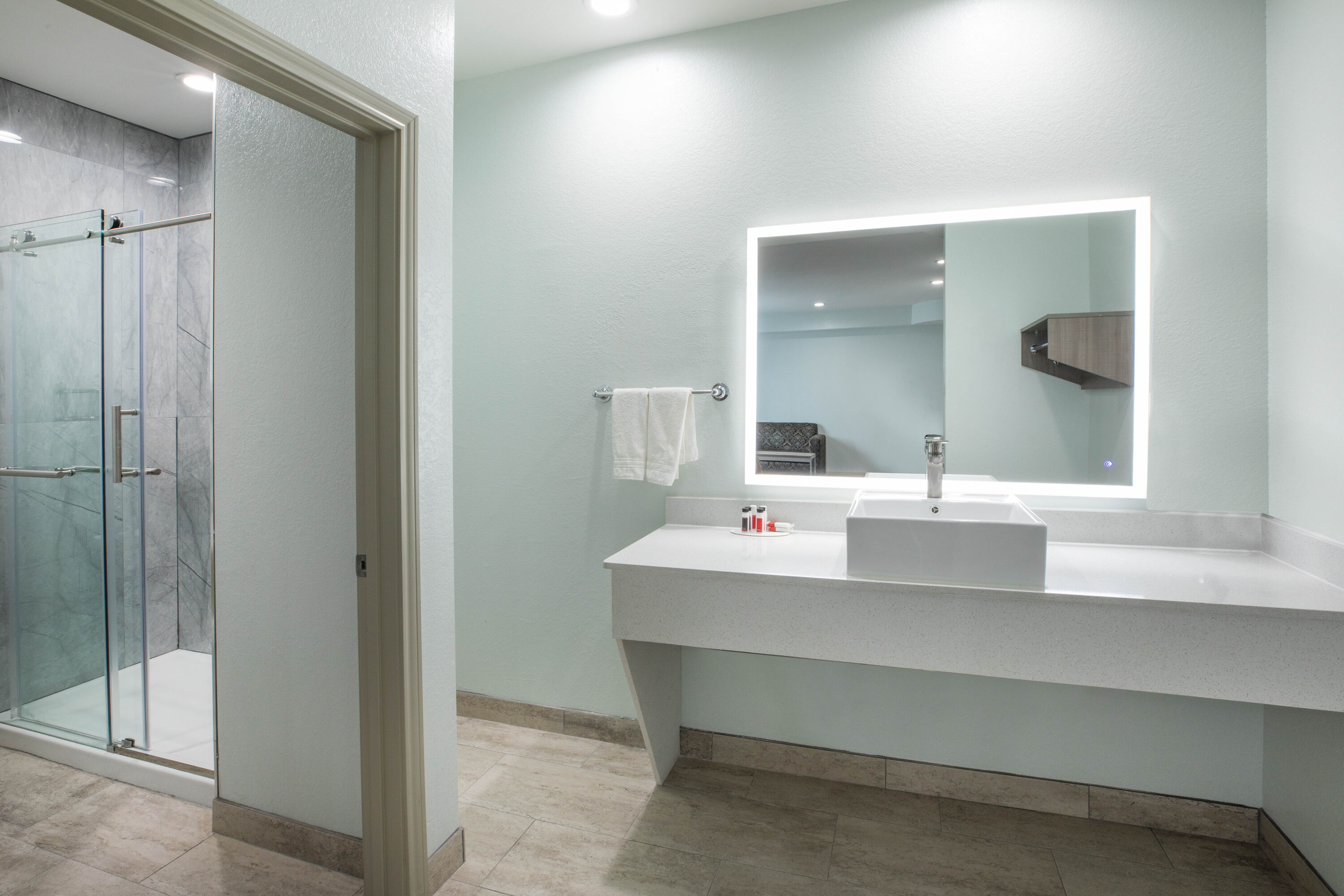 Guest room bath at the Super 8 by Wyndham Humble/Fallcreek/Houston in Humble, Texas