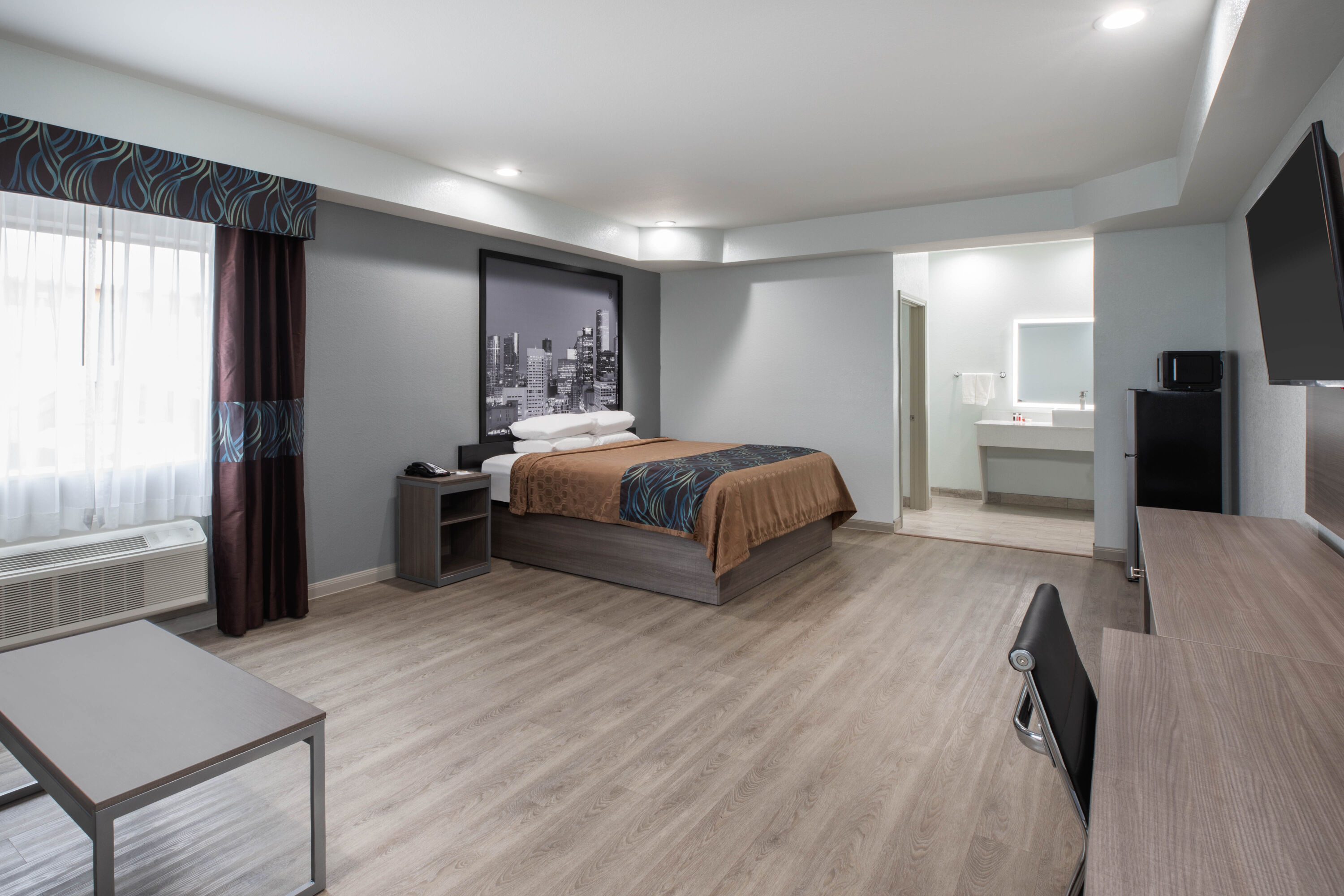 Guest room at the Super 8 by Wyndham Humble/Fallcreek/Houston in Humble, Texas