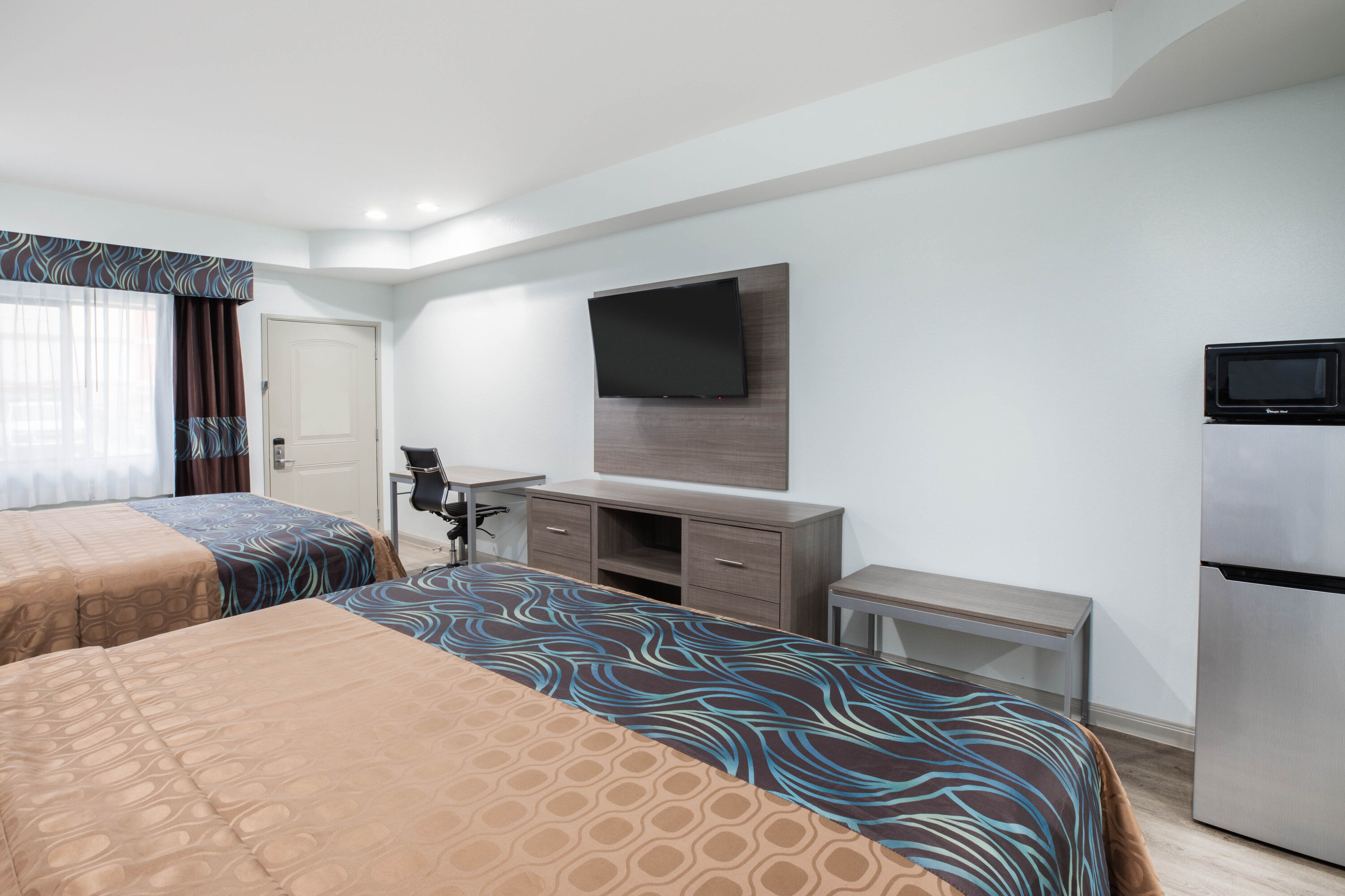 Guest room at the Super 8 by Wyndham Humble/Fallcreek/Houston in Humble, Texas