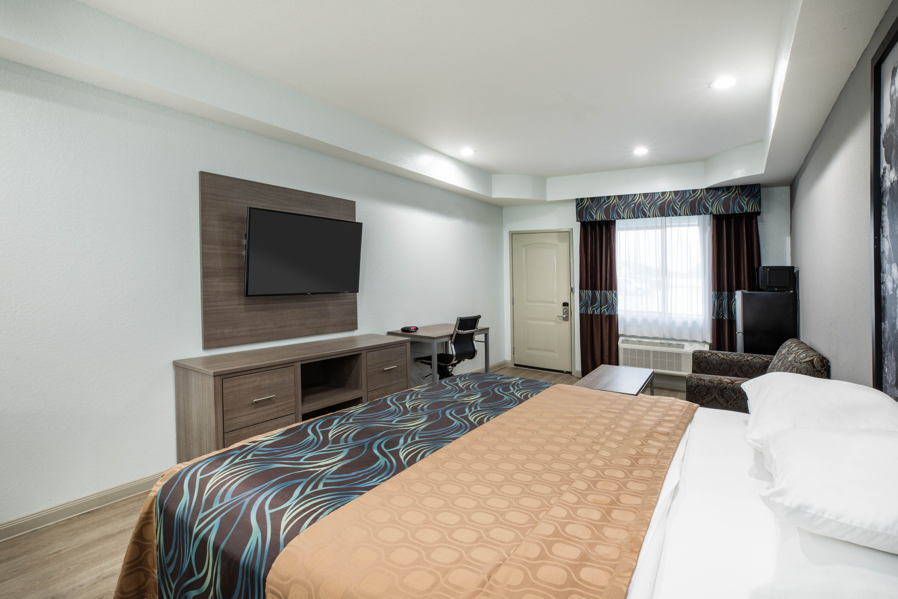 Guest room at the Super 8 by Wyndham Humble/Fallcreek/Houston in Humble, Texas