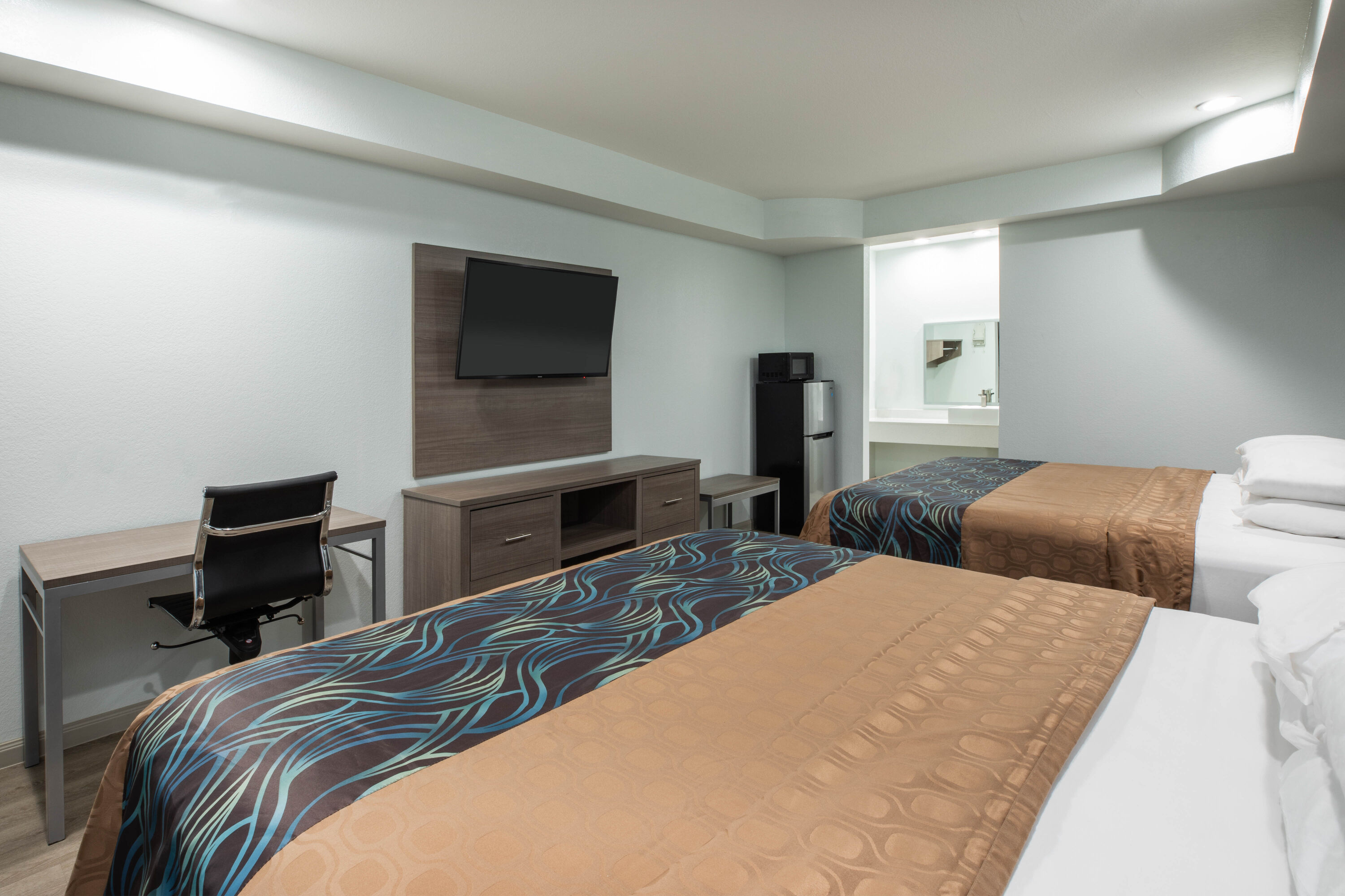 Guest room at the Super 8 by Wyndham Humble/Fallcreek/Houston in Humble, Texas