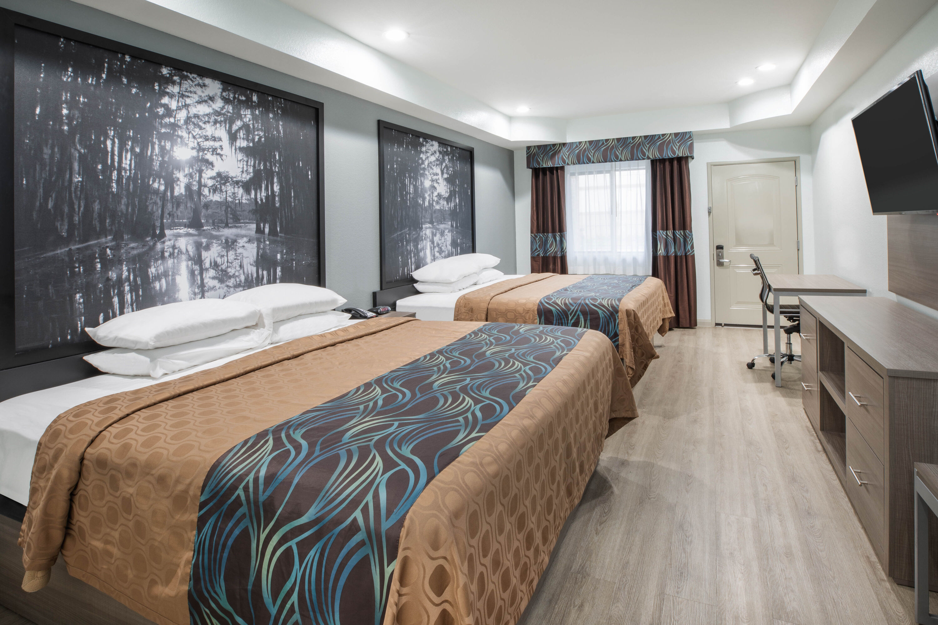 Guest room at the Super 8 by Wyndham Humble/Fallcreek/Houston in Humble, Texas