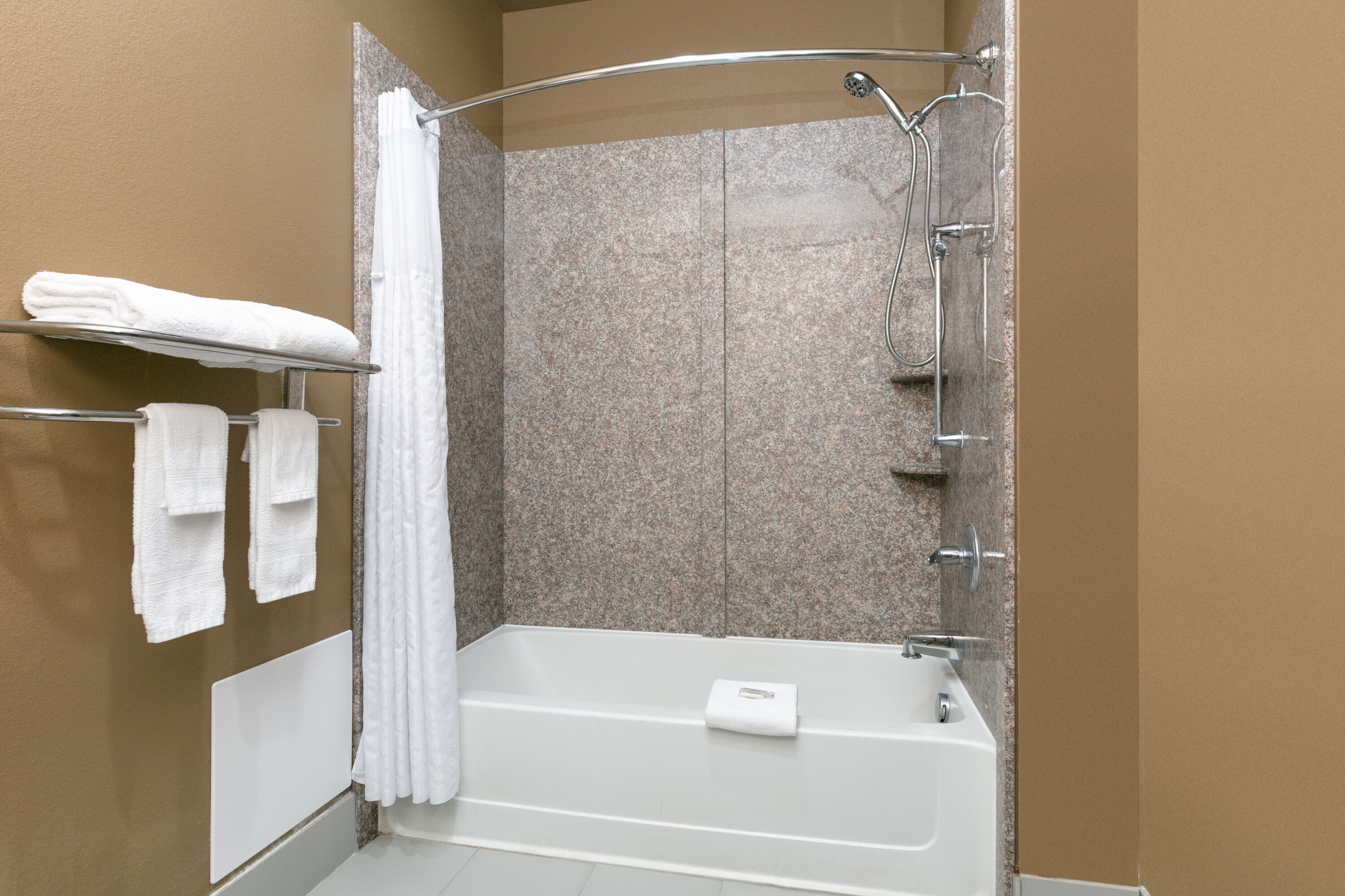 Guest room bath at the Super 8 by Wyndham Karnes City in Karnes City, Texas