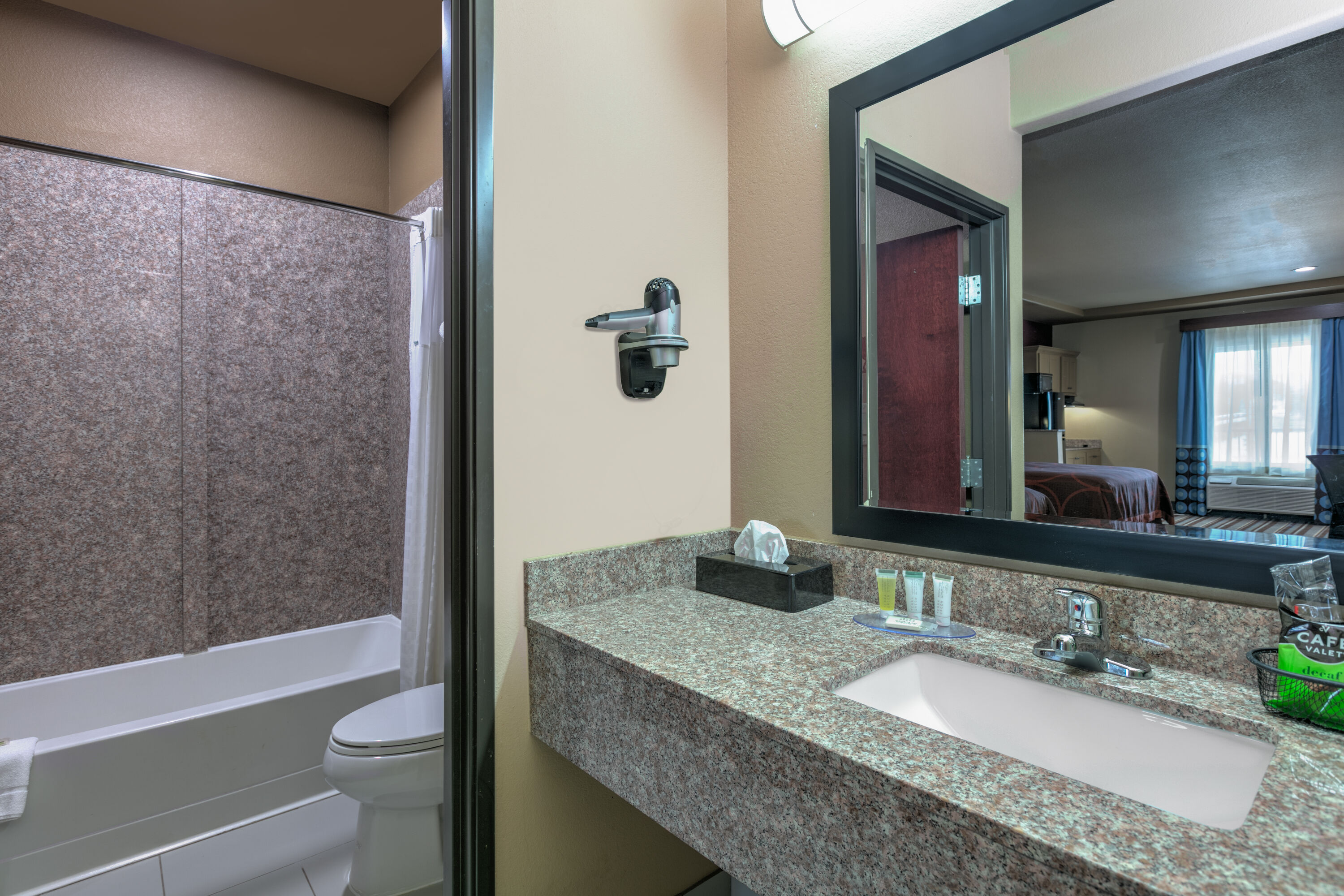 Guest room bath at the Super 8 by Wyndham Karnes City in Karnes City, Texas