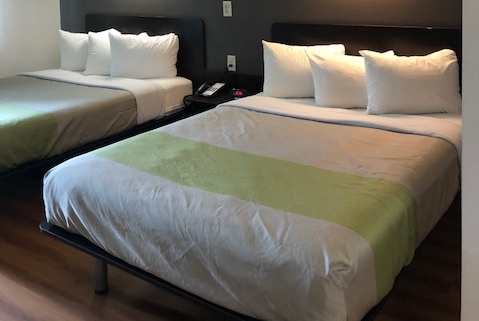 Guest room at the Super 8 by Wyndham Kenedy in Kenedy, Texas