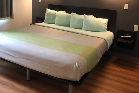 Guest room at the Super 8 by Wyndham Kenedy in Kenedy, Texas