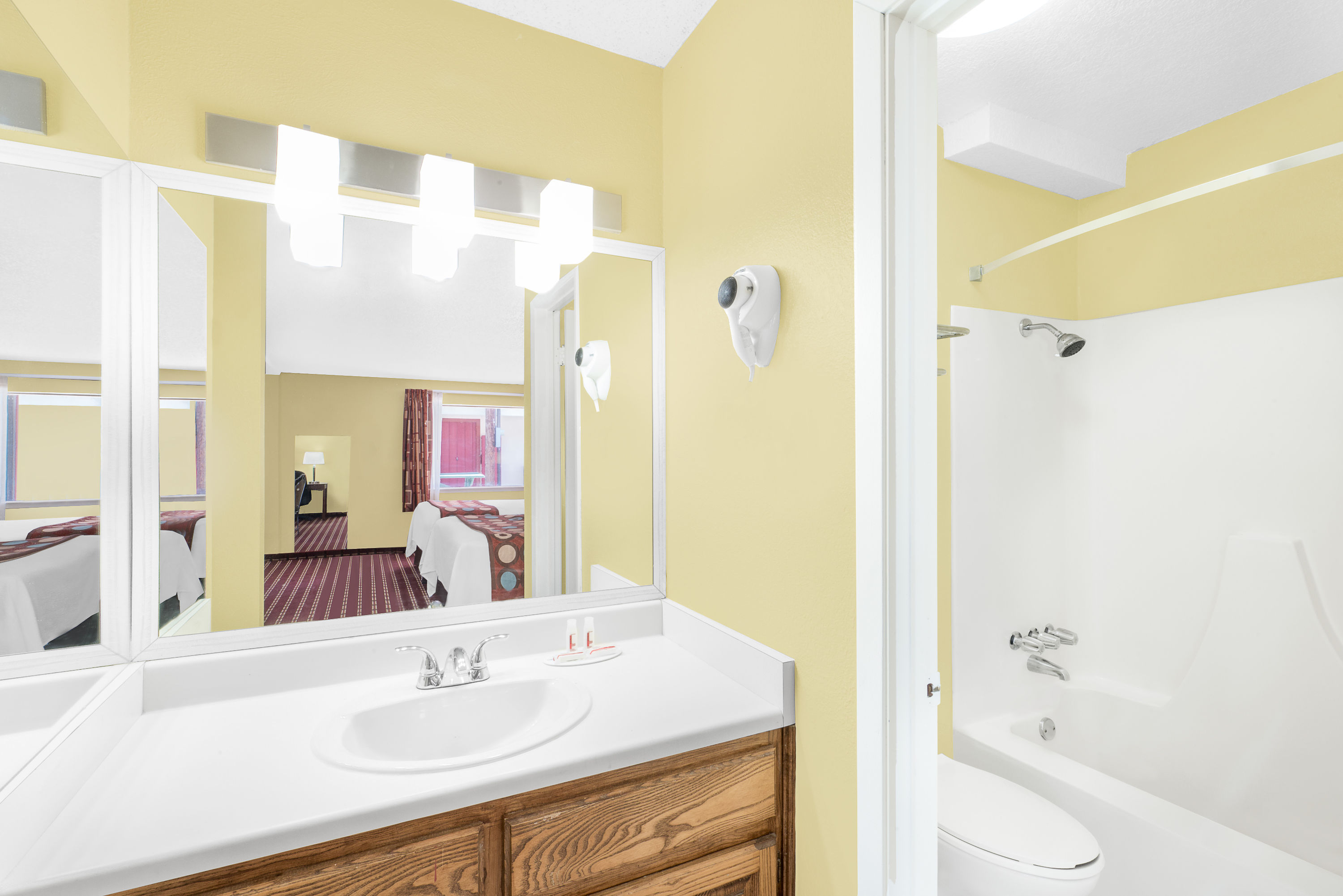 Guest room bath at the Super 8 by Wyndham Kerrville TX in Kerrville, Texas
