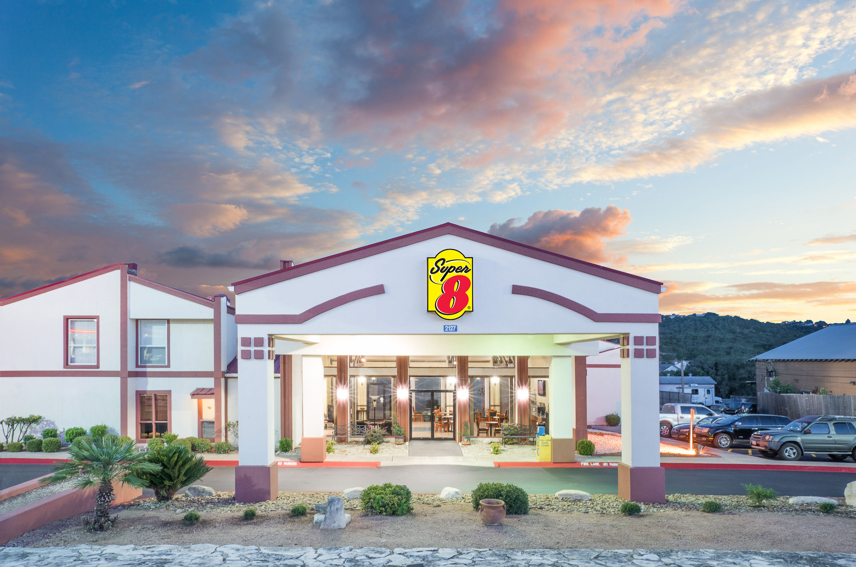 Exterior Dusk Image of Super 8 by Wyndham Kerrville TX hotel in Kerrville, Texas