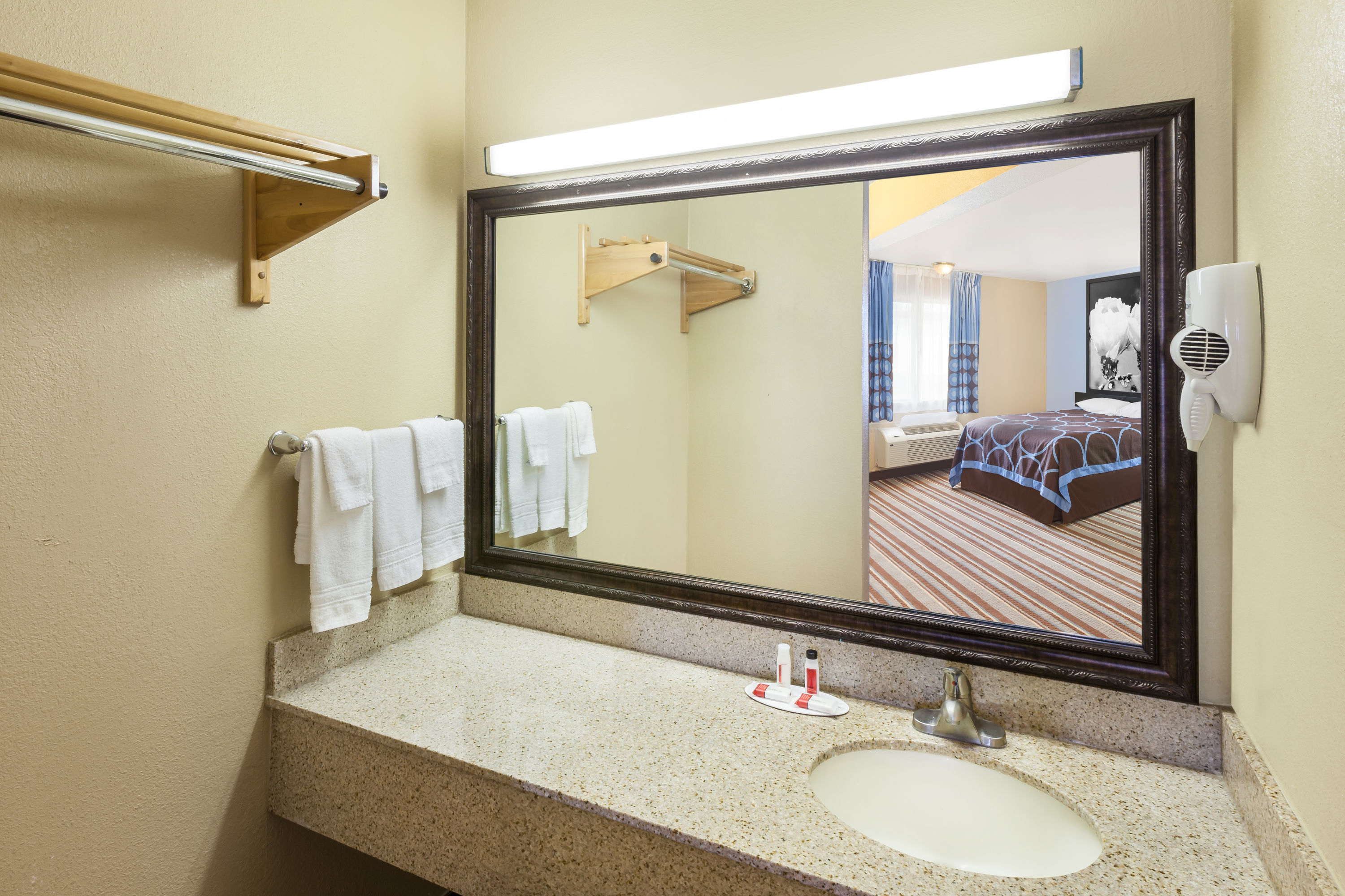 Guest room bath at the Super 8 by Wyndham Kingsville in Kingsville, Texas