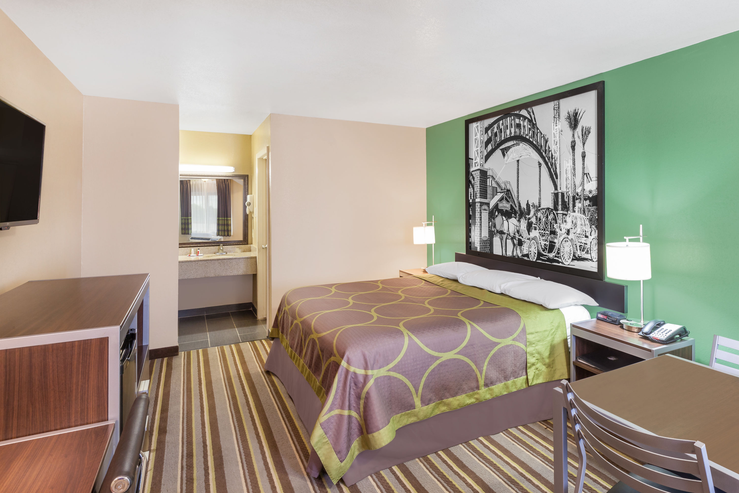 Guest room at the Super 8 by Wyndham Kingsville in Kingsville, Texas