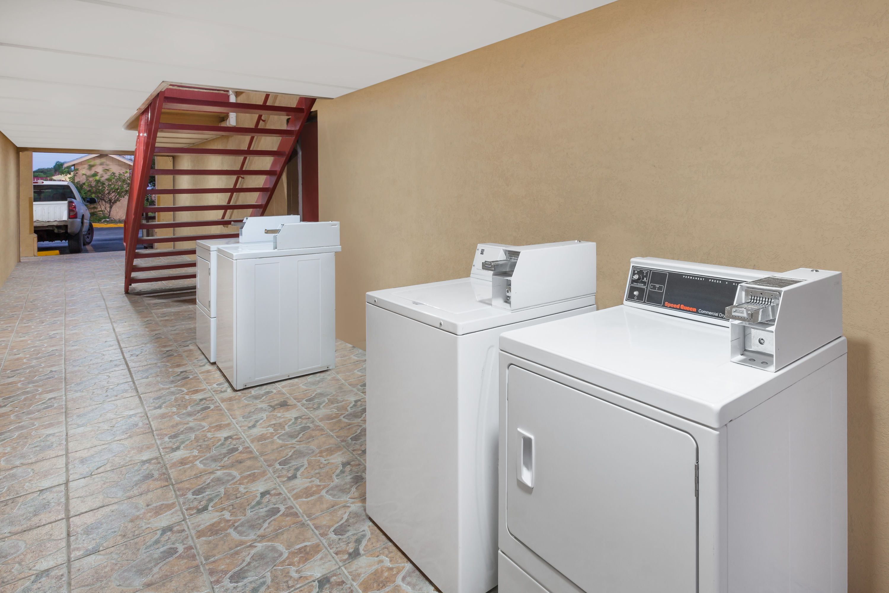 Laundry facilities at Super 8 by Wyndham Kingsville in Kingsville, Texas