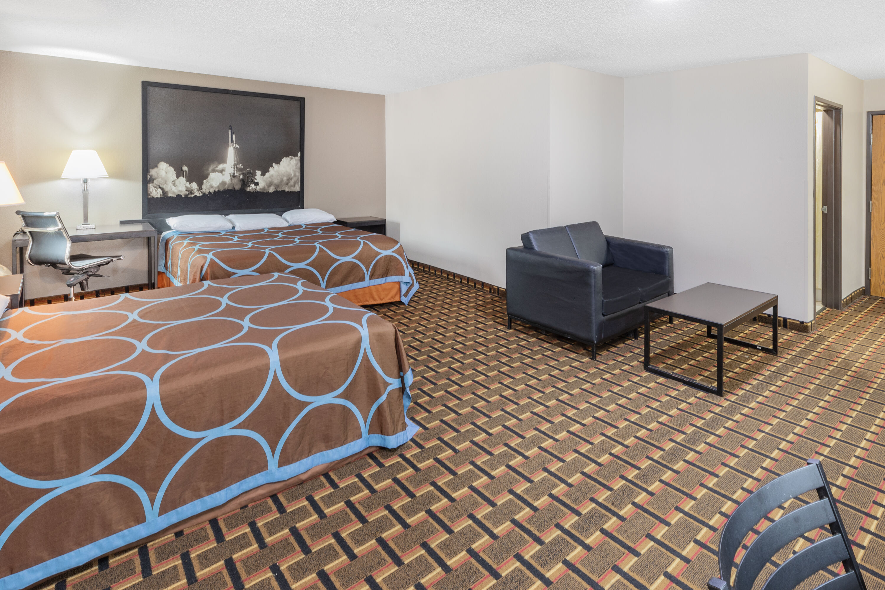 Guest room at the Super 8 by Wyndham League City/Kemah Area in League City, Texas