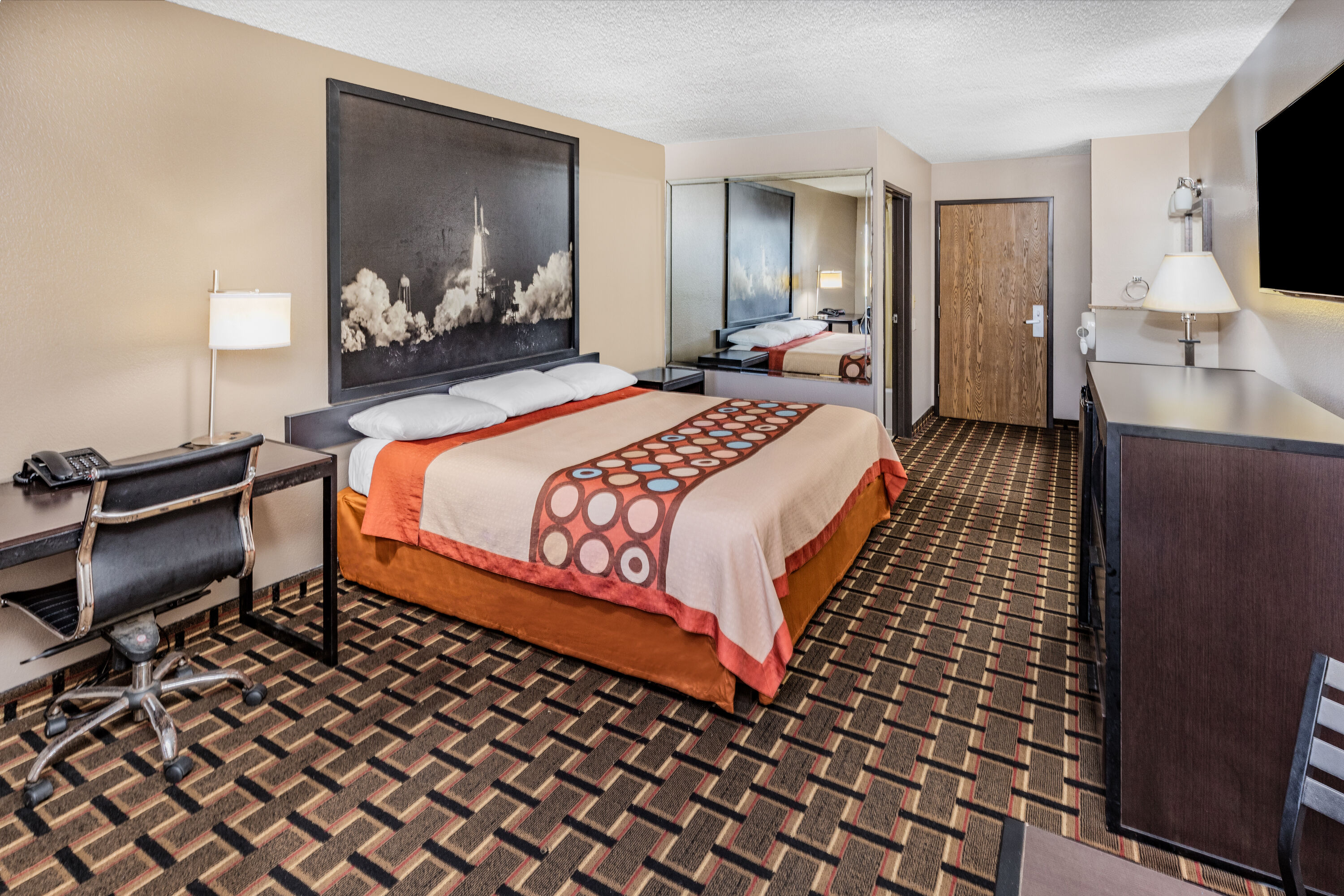 Guest room at the Super 8 by Wyndham League City/Kemah Area in League City, Texas