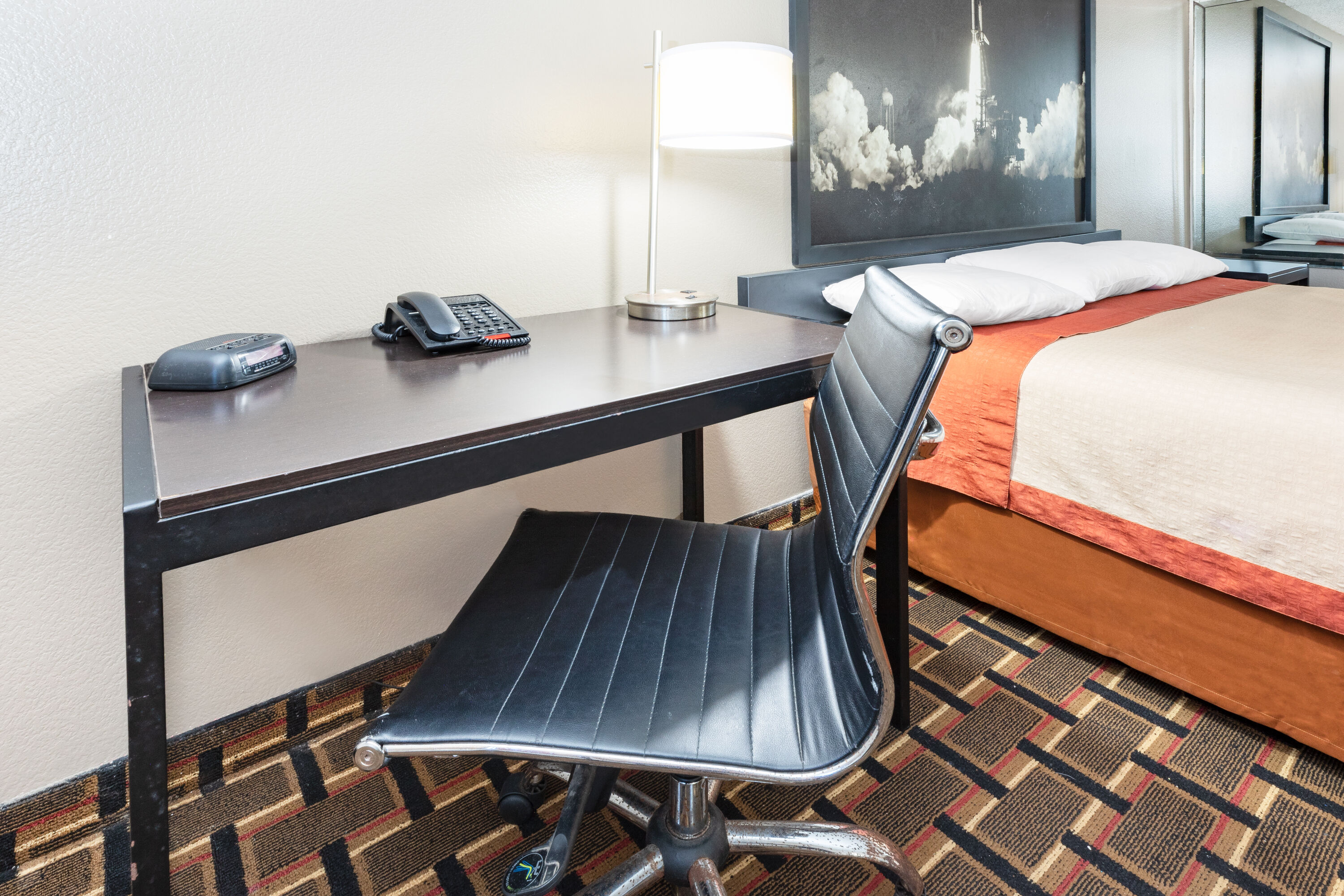 Guest room at the Super 8 by Wyndham League City/Kemah Area in League City, Texas