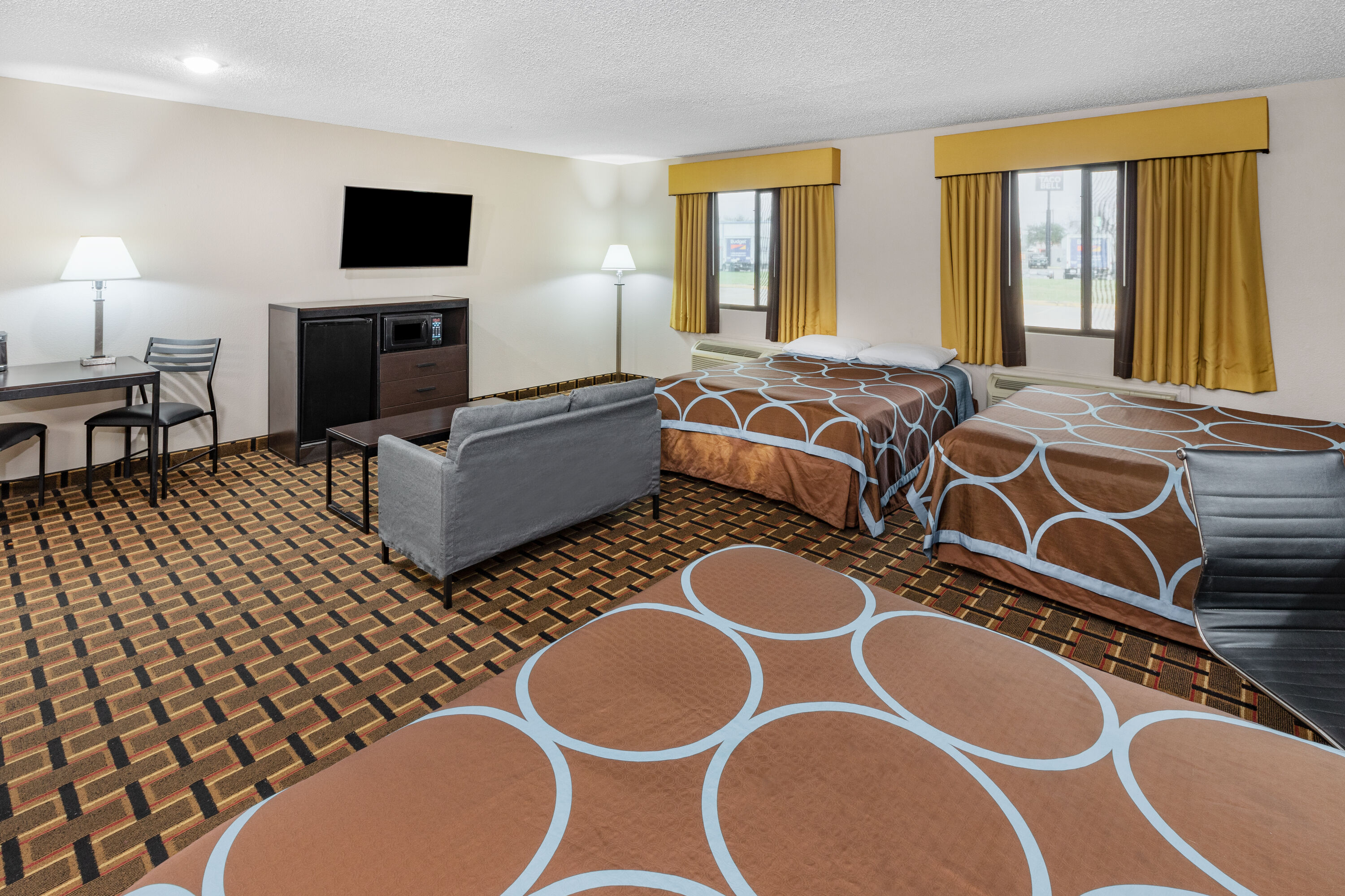 Guest room at the Super 8 by Wyndham League City/Kemah Area in League City, Texas