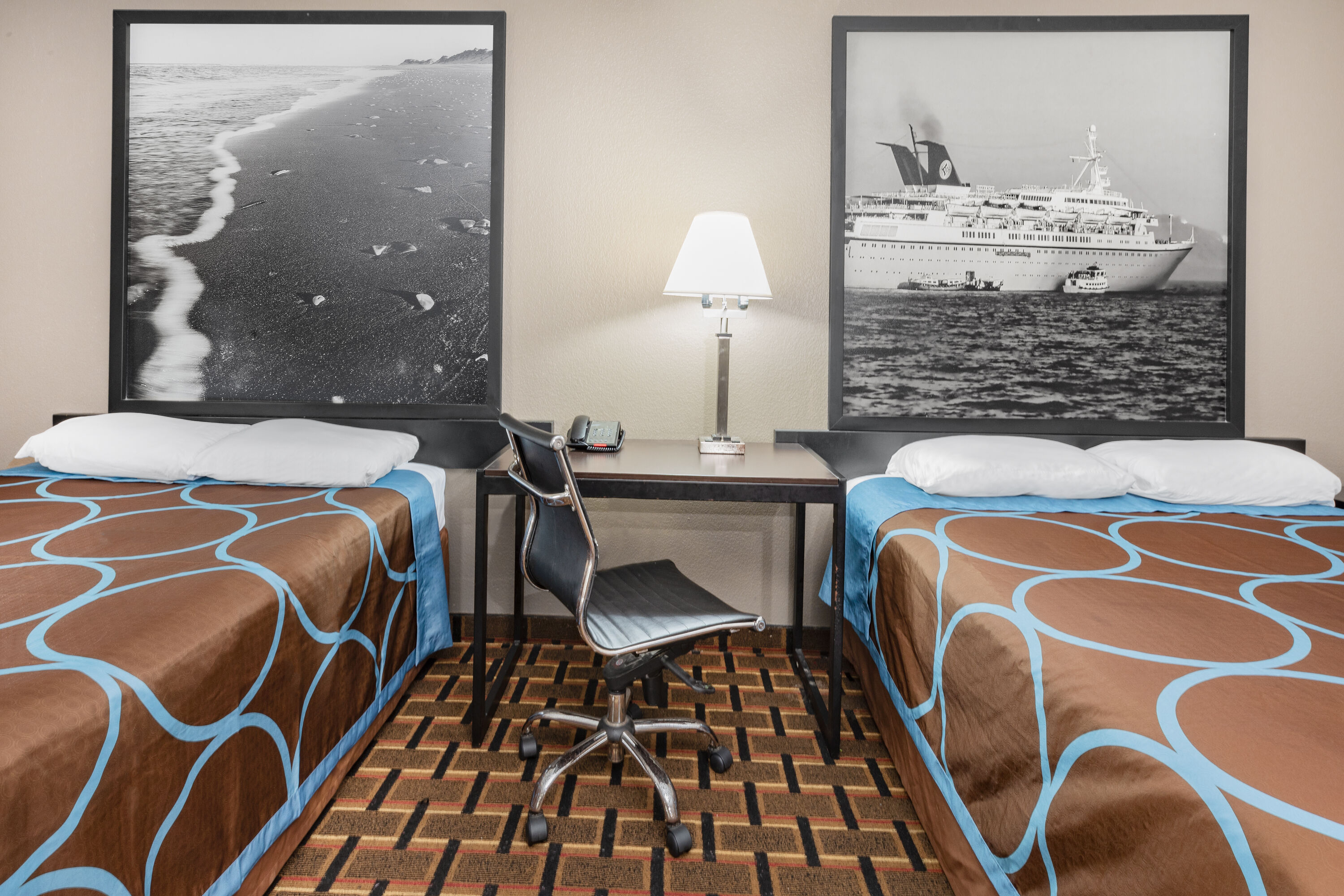 Guest room at the Super 8 by Wyndham League City/Kemah Area in League City, Texas