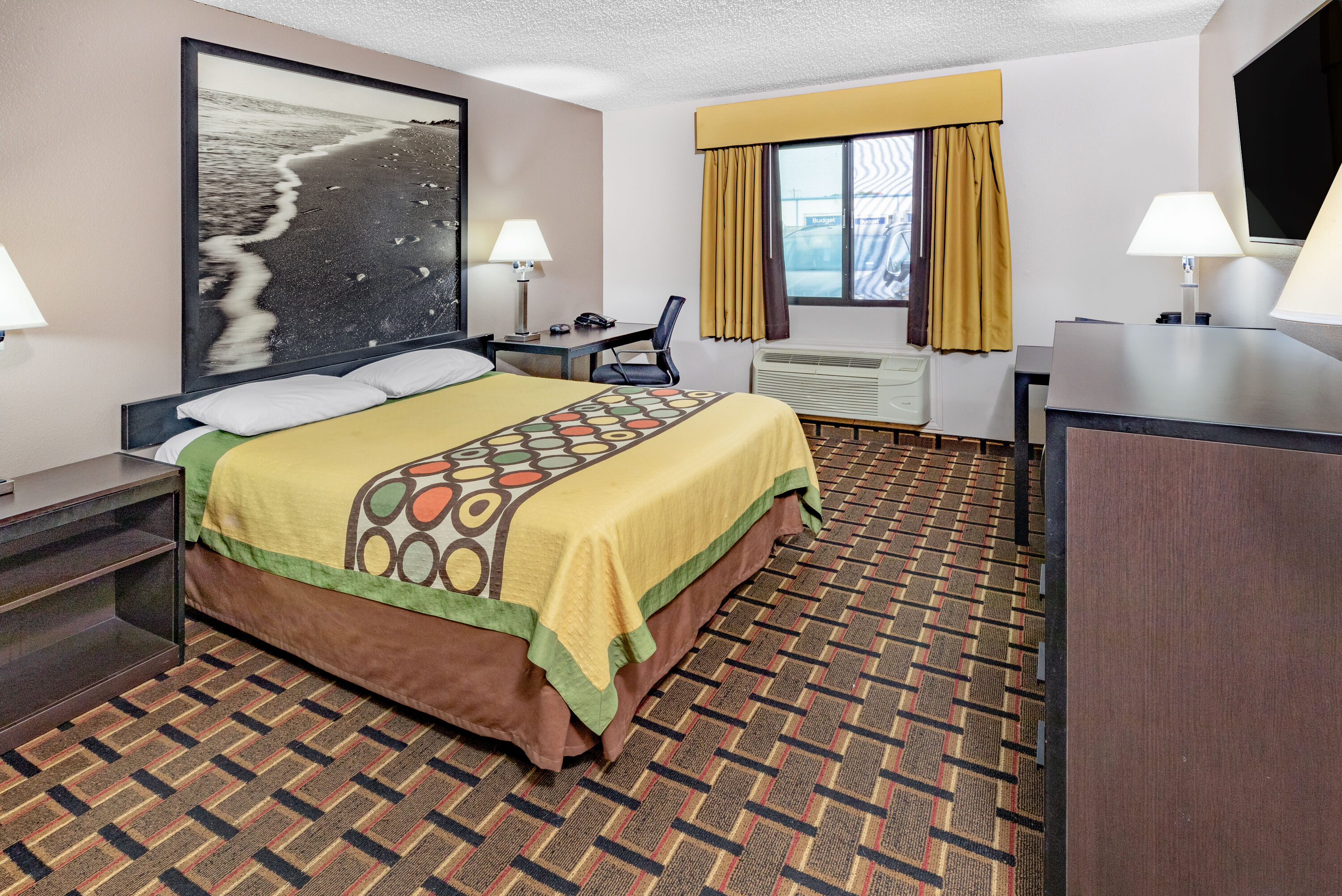 Guest room at the Super 8 by Wyndham League City/Kemah Area in League City, Texas