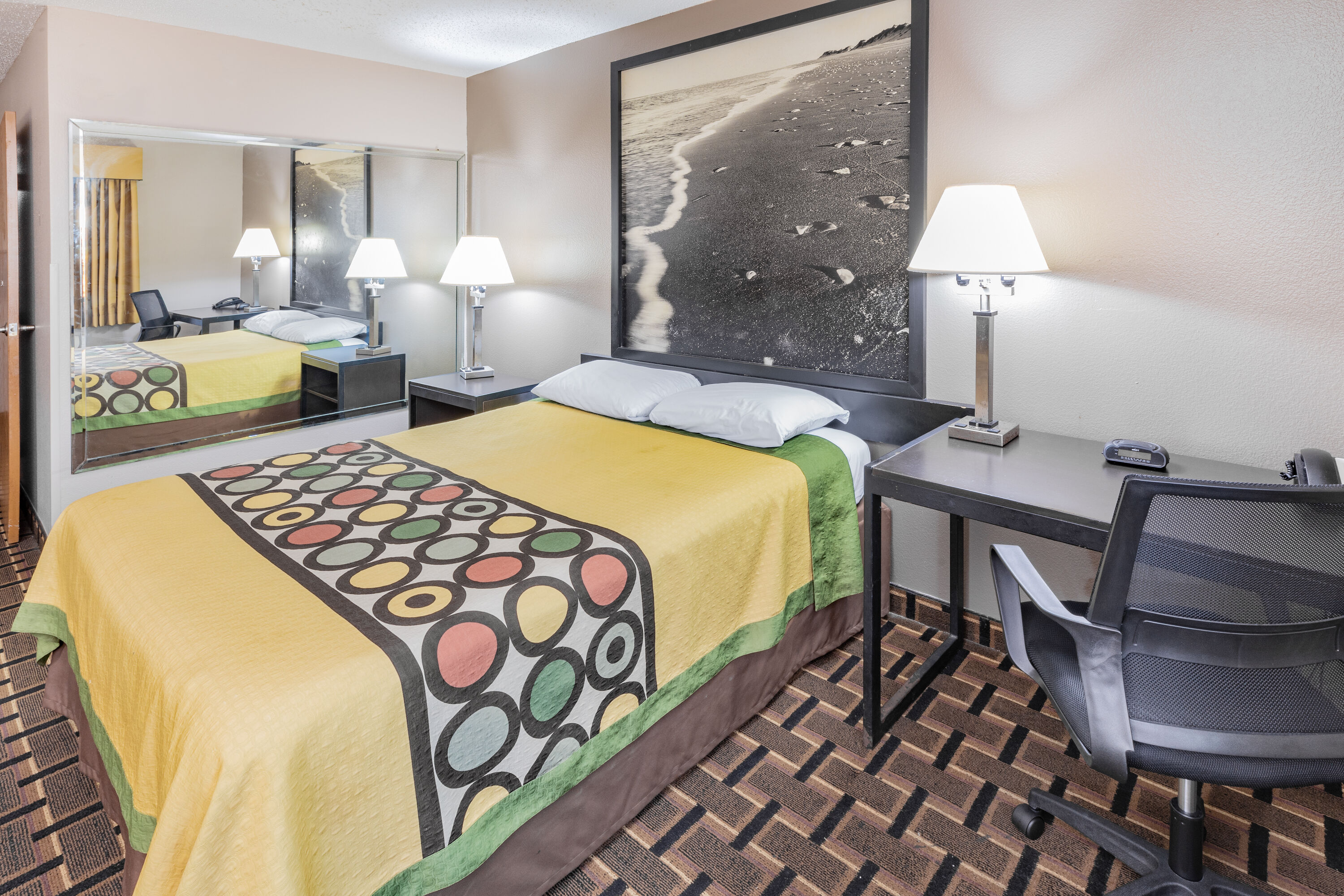 Guest room at the Super 8 by Wyndham League City/Kemah Area in League City, Texas