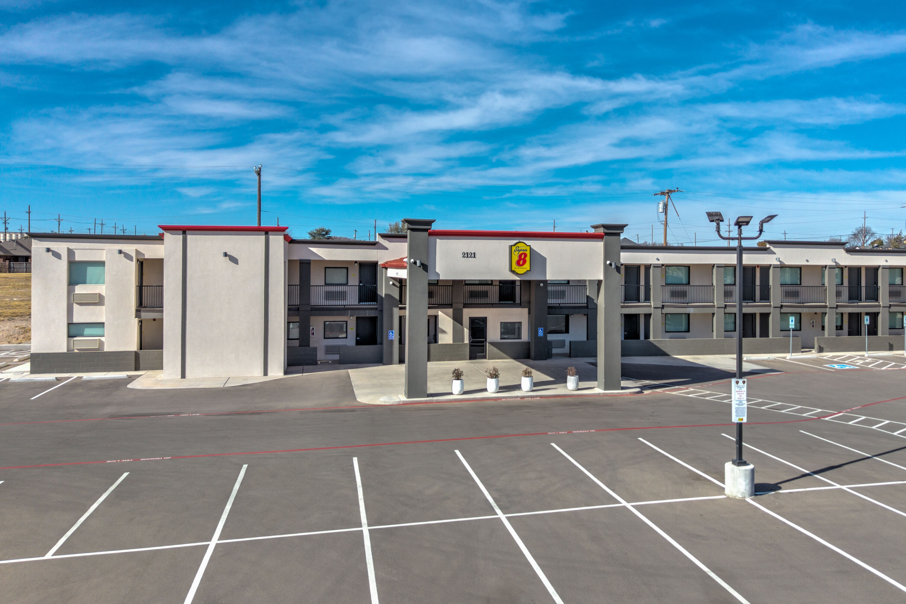 Exterior Day Image of Super 8 by Wyndham Lubbock Airport hotel in Lubbock, Texas