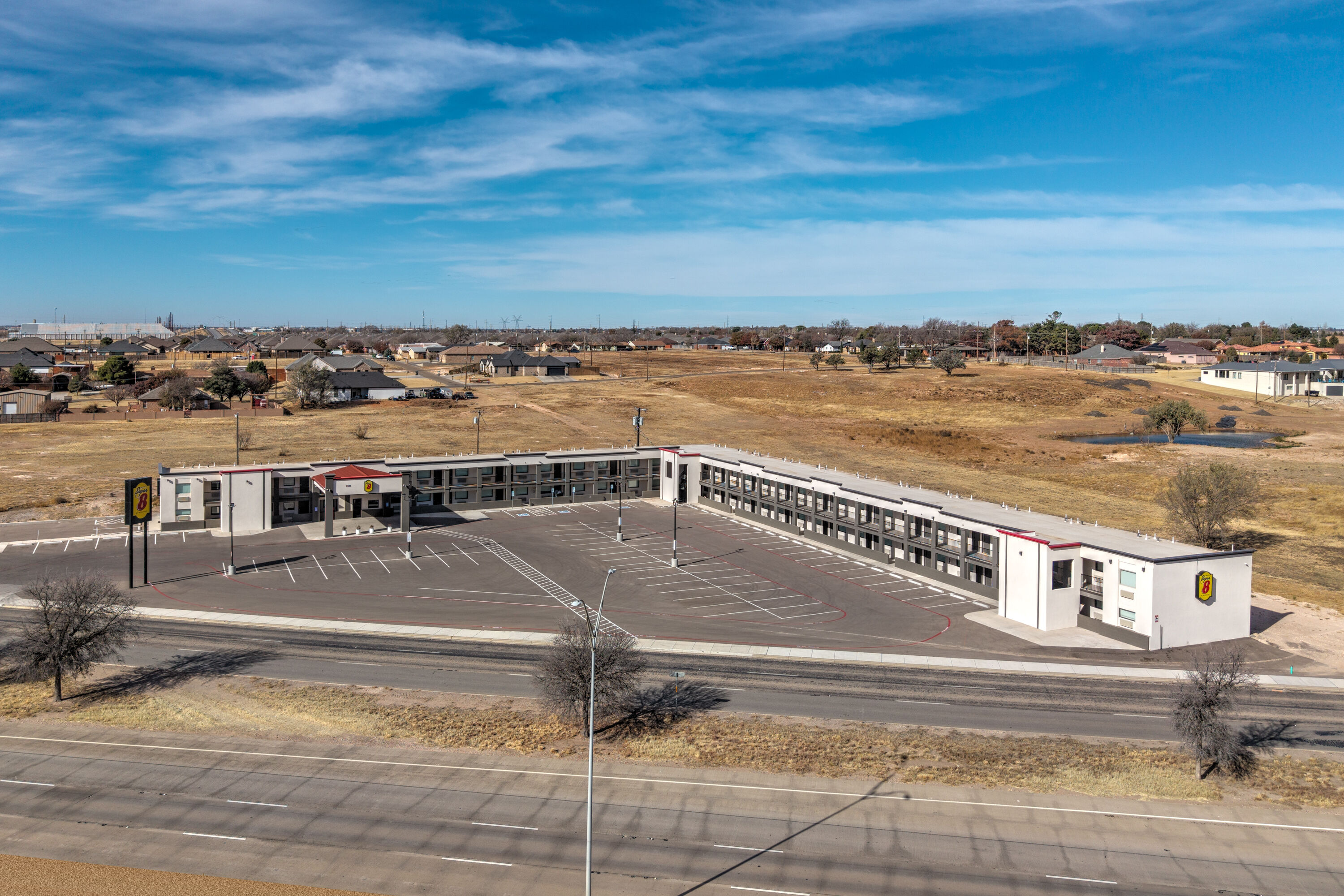 Exterior Day Image of Super 8 by Wyndham Lubbock Airport hotel in Lubbock, Texas