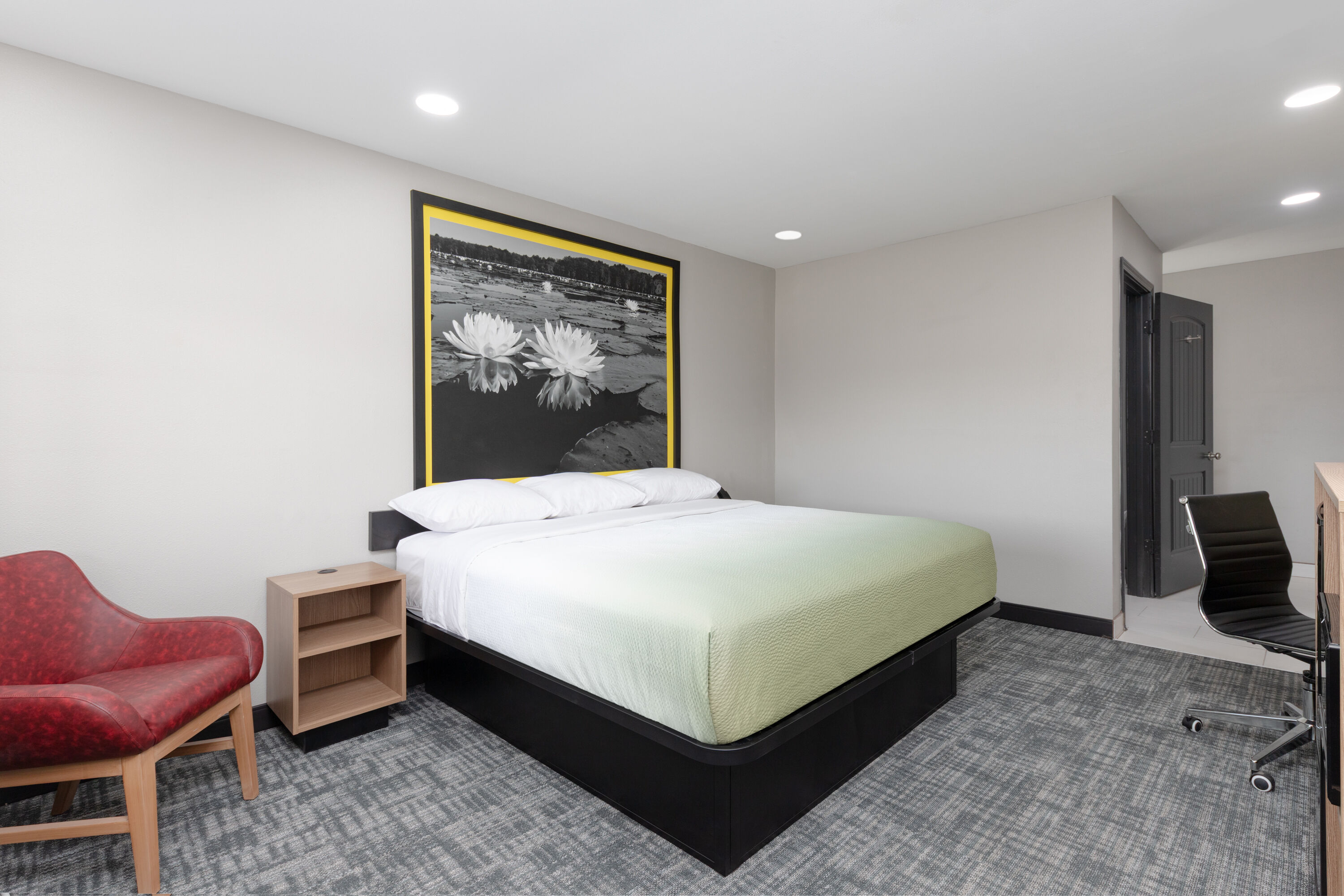 Guest room at the Super 8 by Wyndham Lubbock Airport in Lubbock, Texas