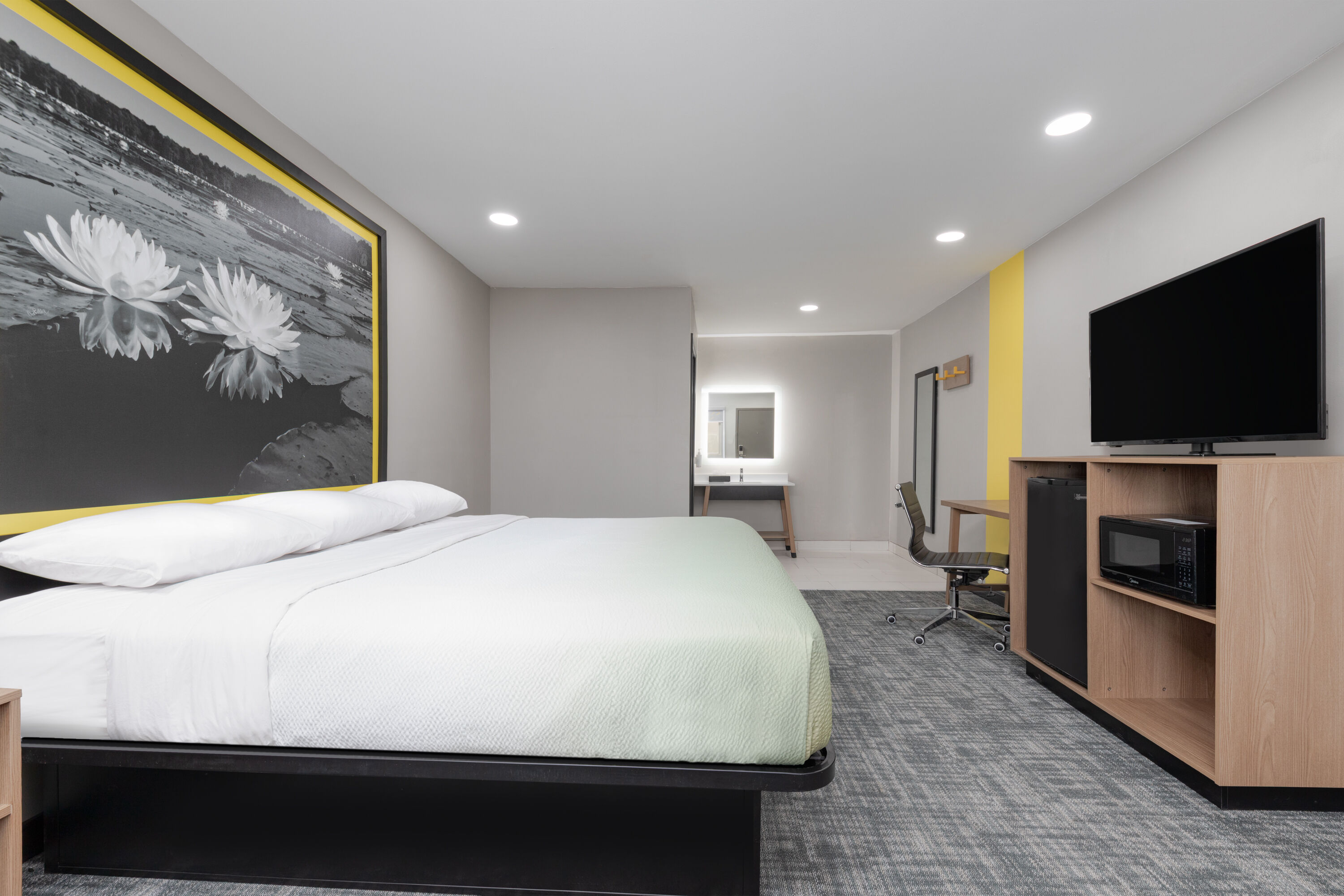 Guest room at the Super 8 by Wyndham Lubbock Airport in Lubbock, Texas