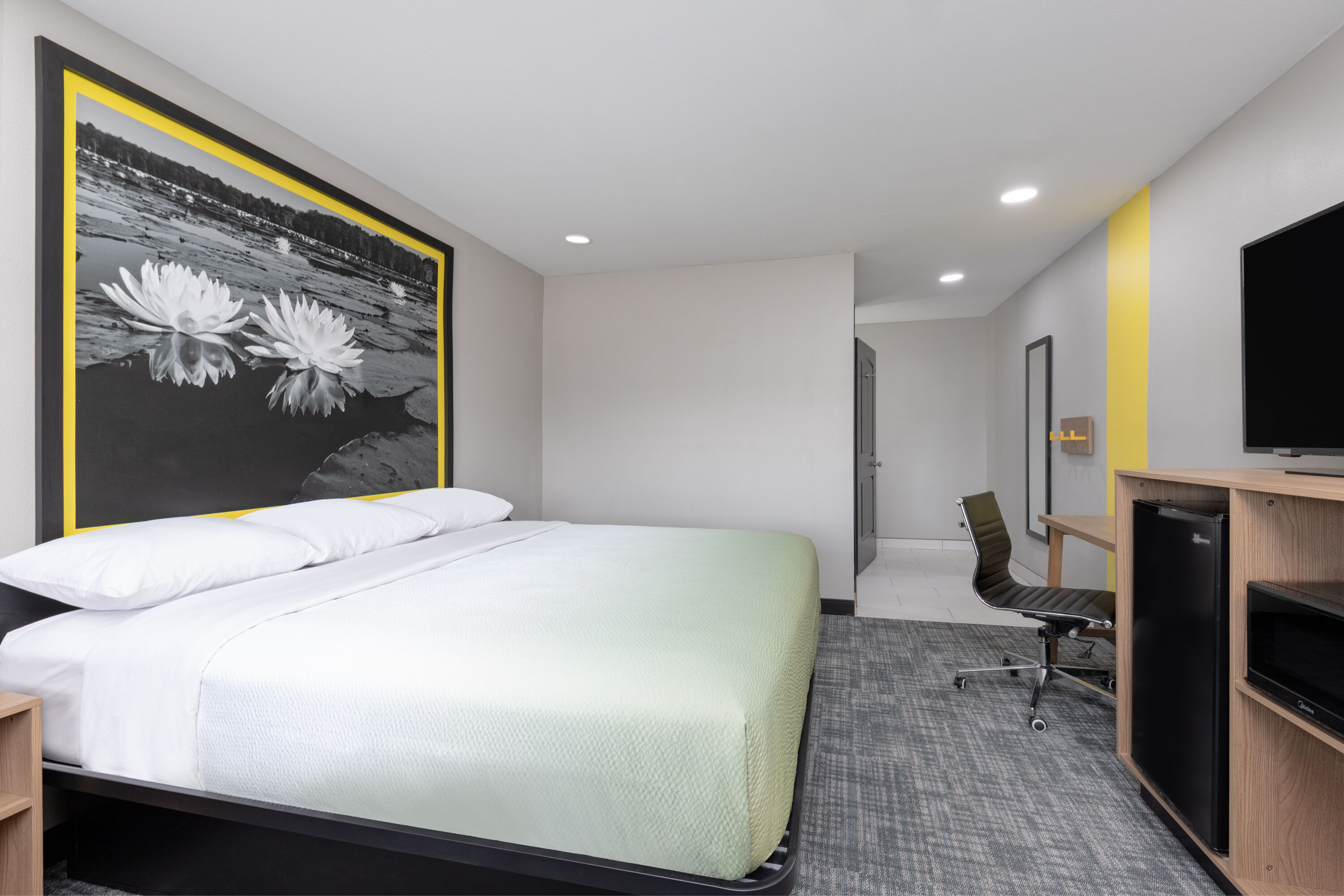 Guest room at the Super 8 by Wyndham Lubbock Airport in Lubbock, Texas