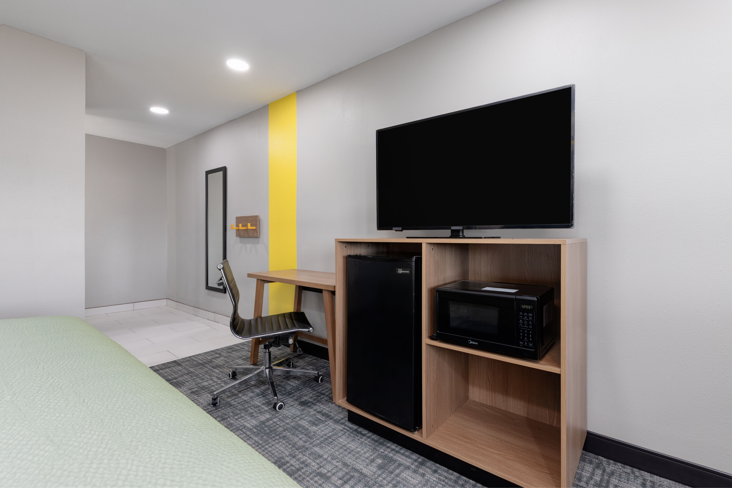 Guest room at the Super 8 by Wyndham Lubbock Airport in Lubbock, Texas