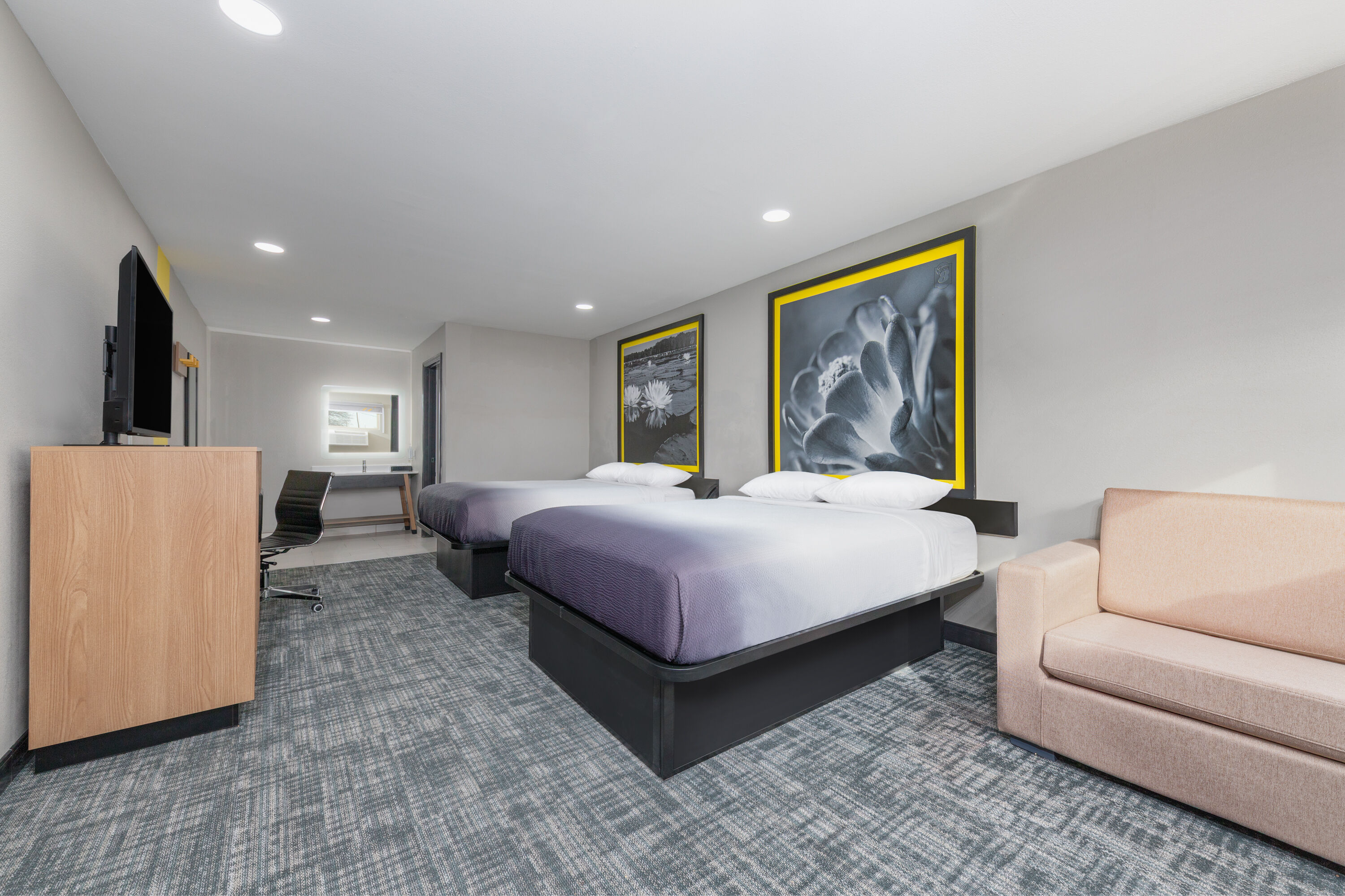 Guest room at the Super 8 by Wyndham Lubbock Airport in Lubbock, Texas