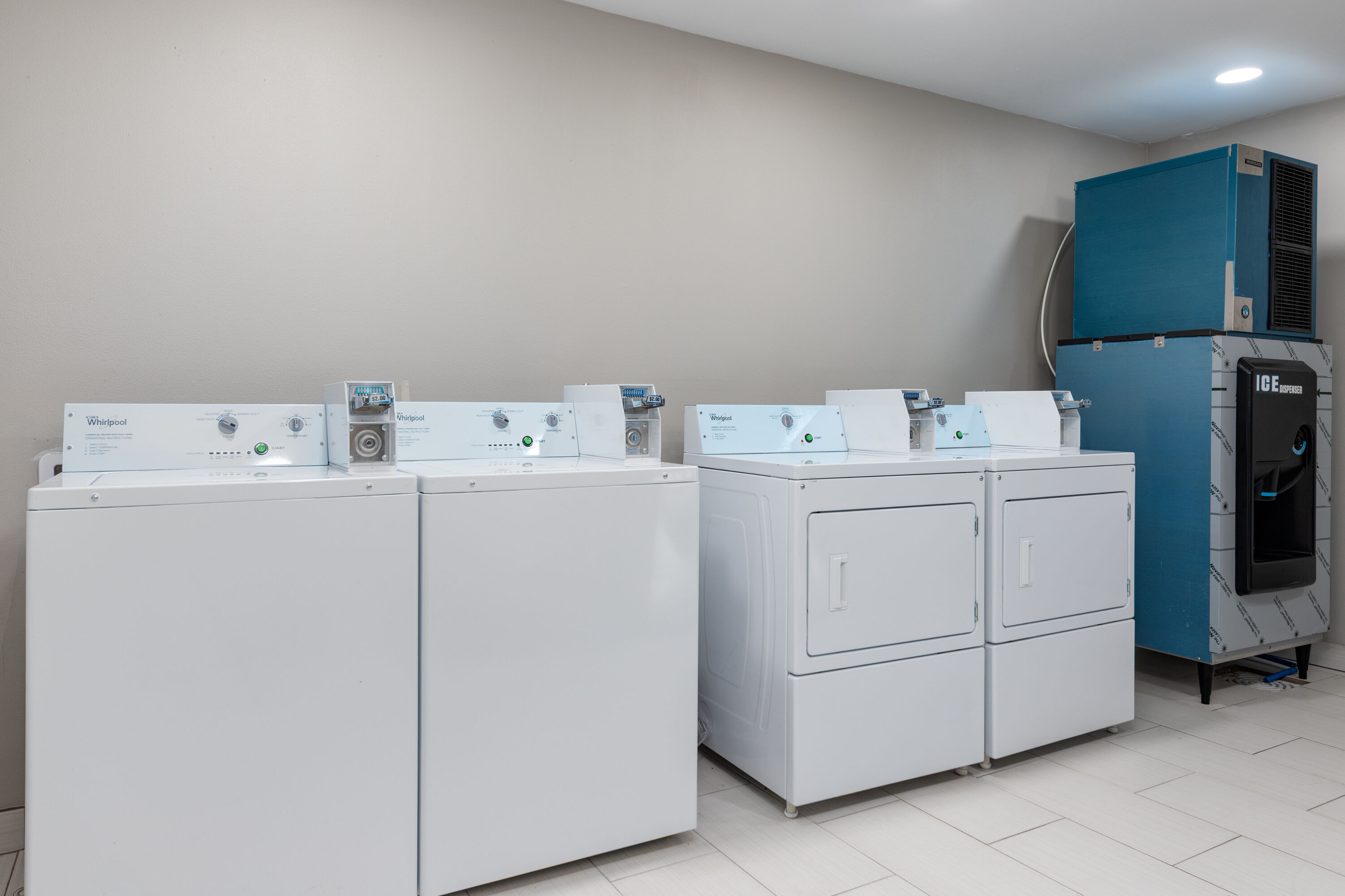 Laundry facilities at Super 8 by Wyndham Lubbock Airport in Lubbock, Texas