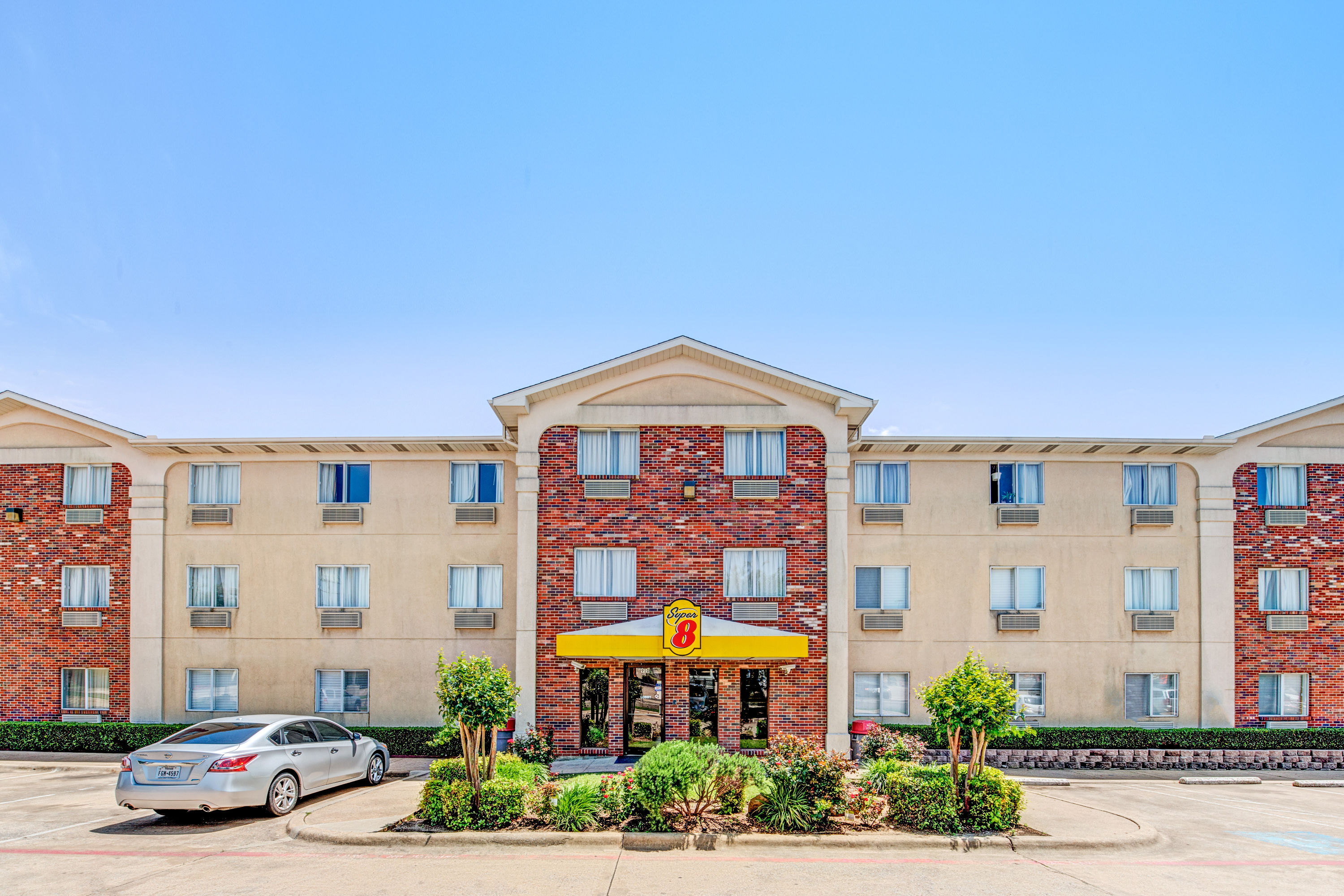 Exterior of Super 8 by Wyndham, McKinney/Plano Area hotel in McKinney, Texas