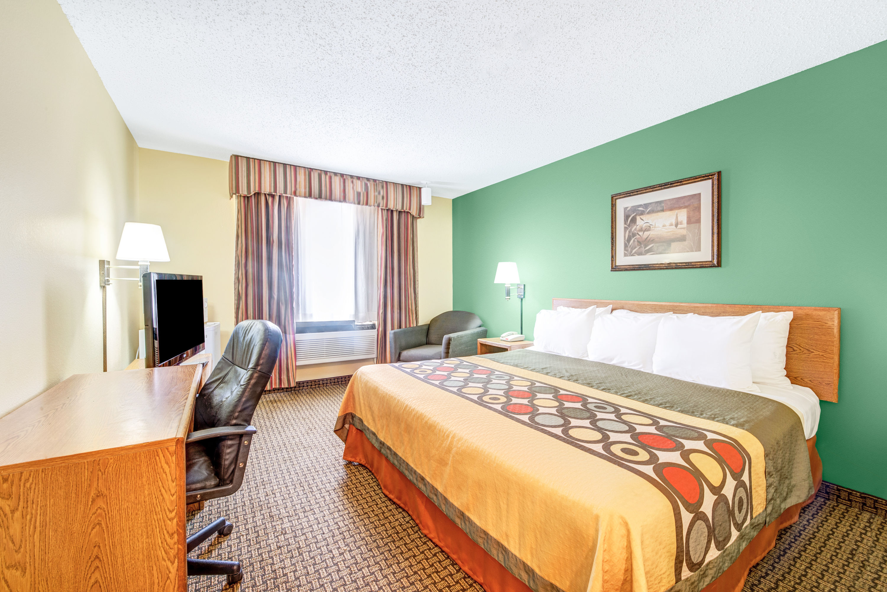 Guest room at the Super 8 by Wyndham, McKinney/Plano Area in McKinney, Texas