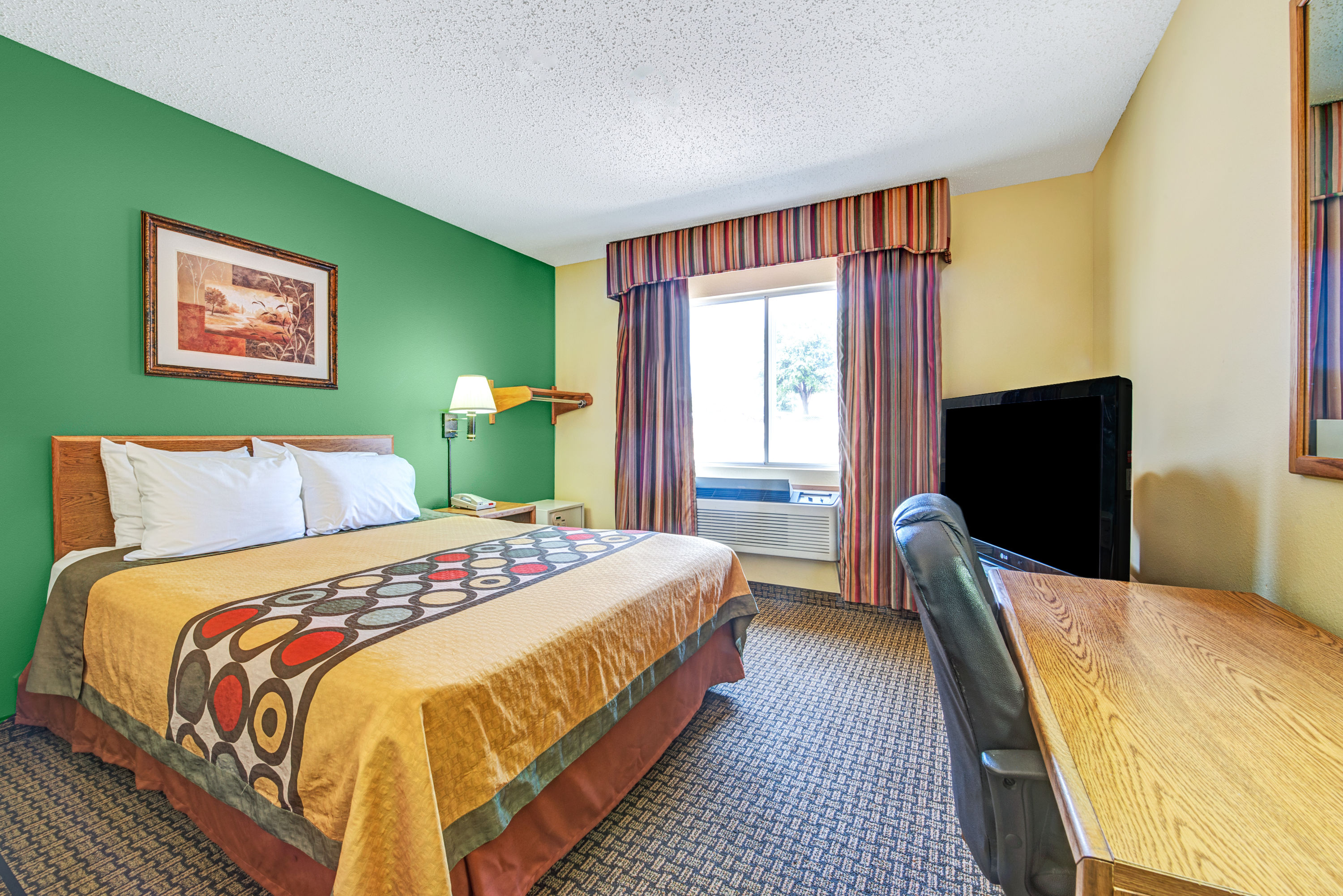 Guest room at the Super 8 by Wyndham, McKinney/Plano Area in McKinney, Texas