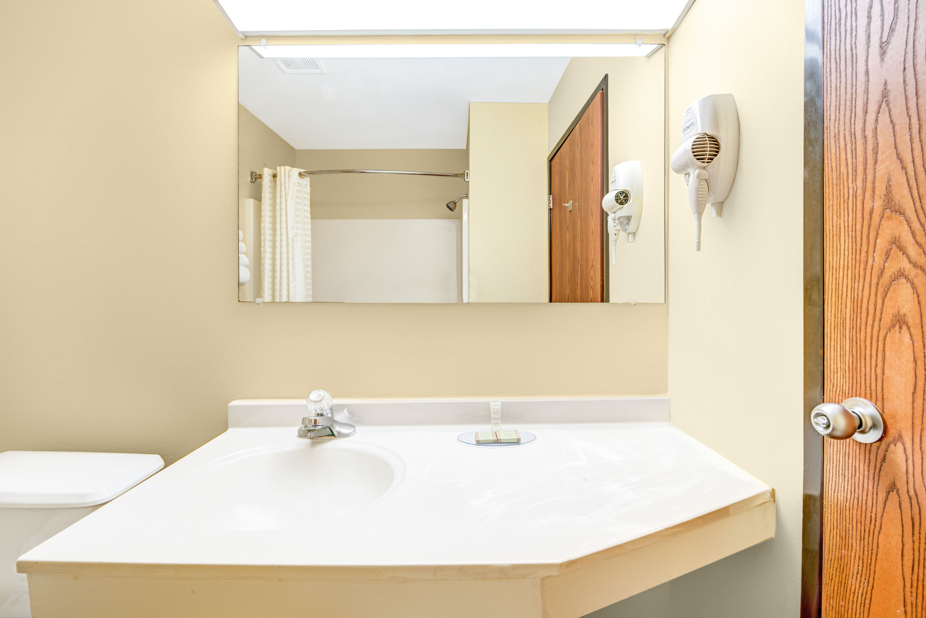 Guest room at the Super 8 by Wyndham, McKinney/Plano Area in McKinney, Texas