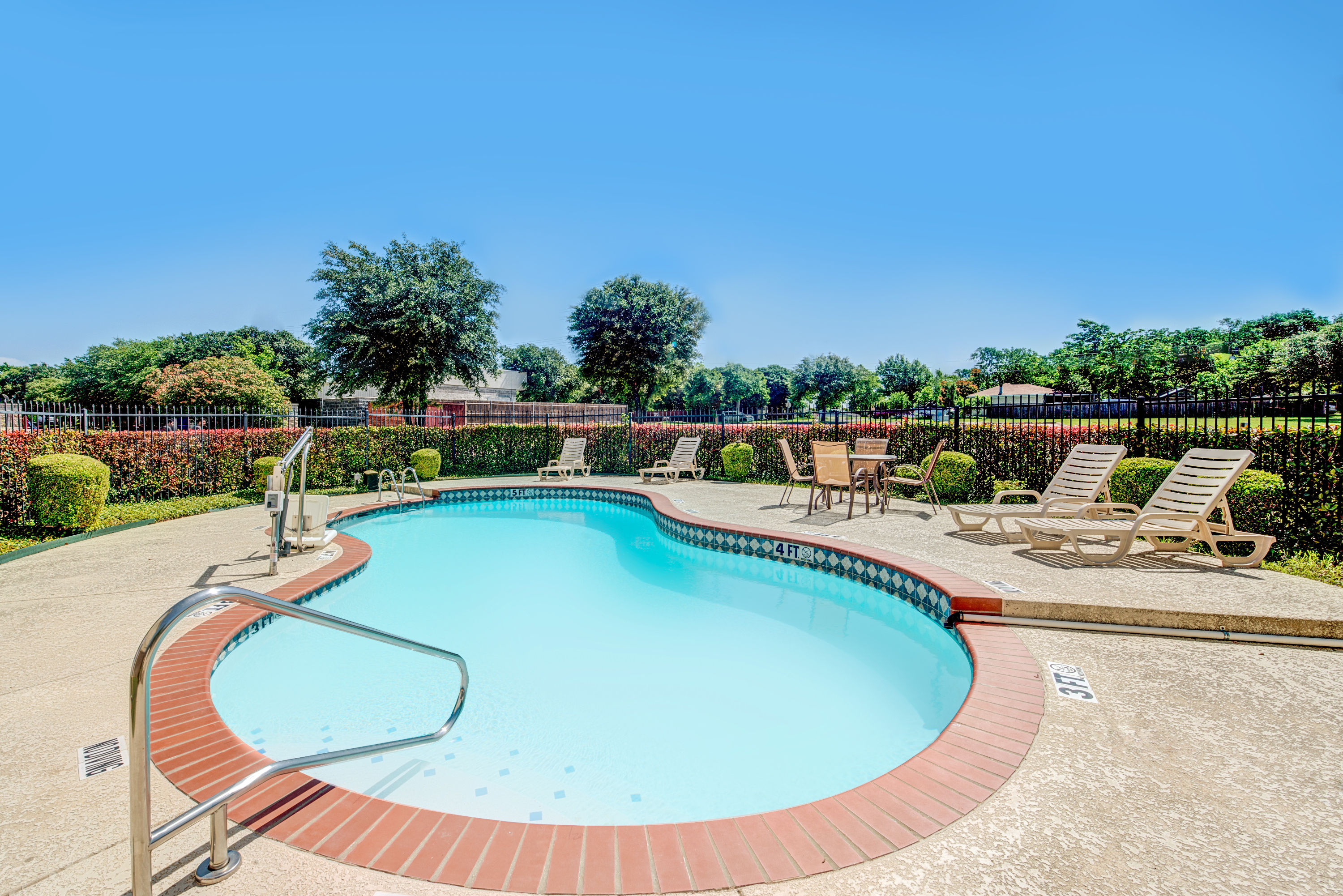 Pool at the Super 8 by Wyndham, McKinney/Plano Area in McKinney, Texas