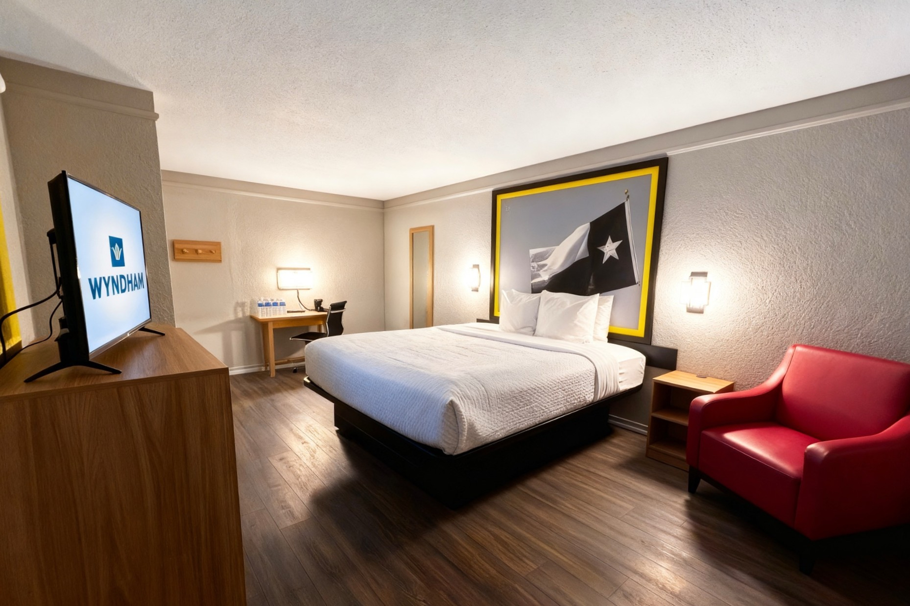 Guest room at the Super 8 by Wyndham Nacogdoches Near University in Nacogdoches, Texas