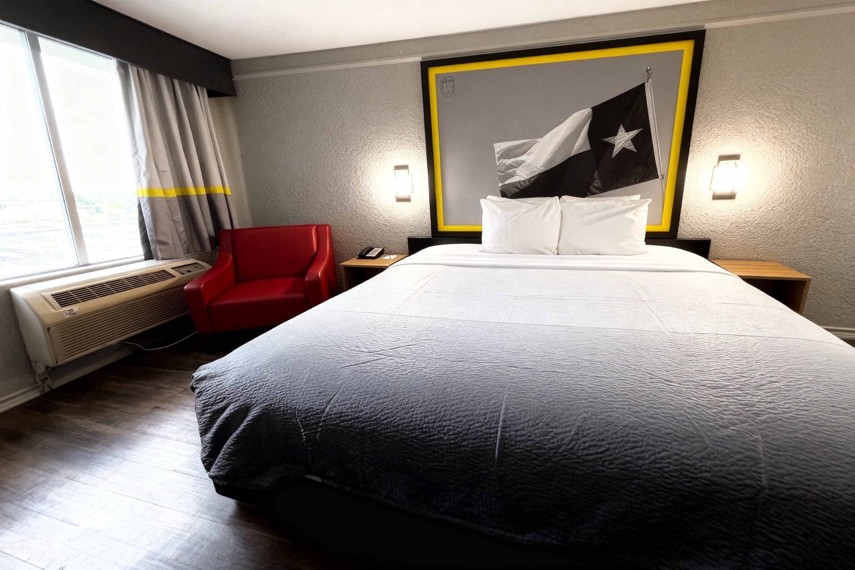 Guest room at the Super 8 by Wyndham Nacogdoches Near University in Nacogdoches, Texas
