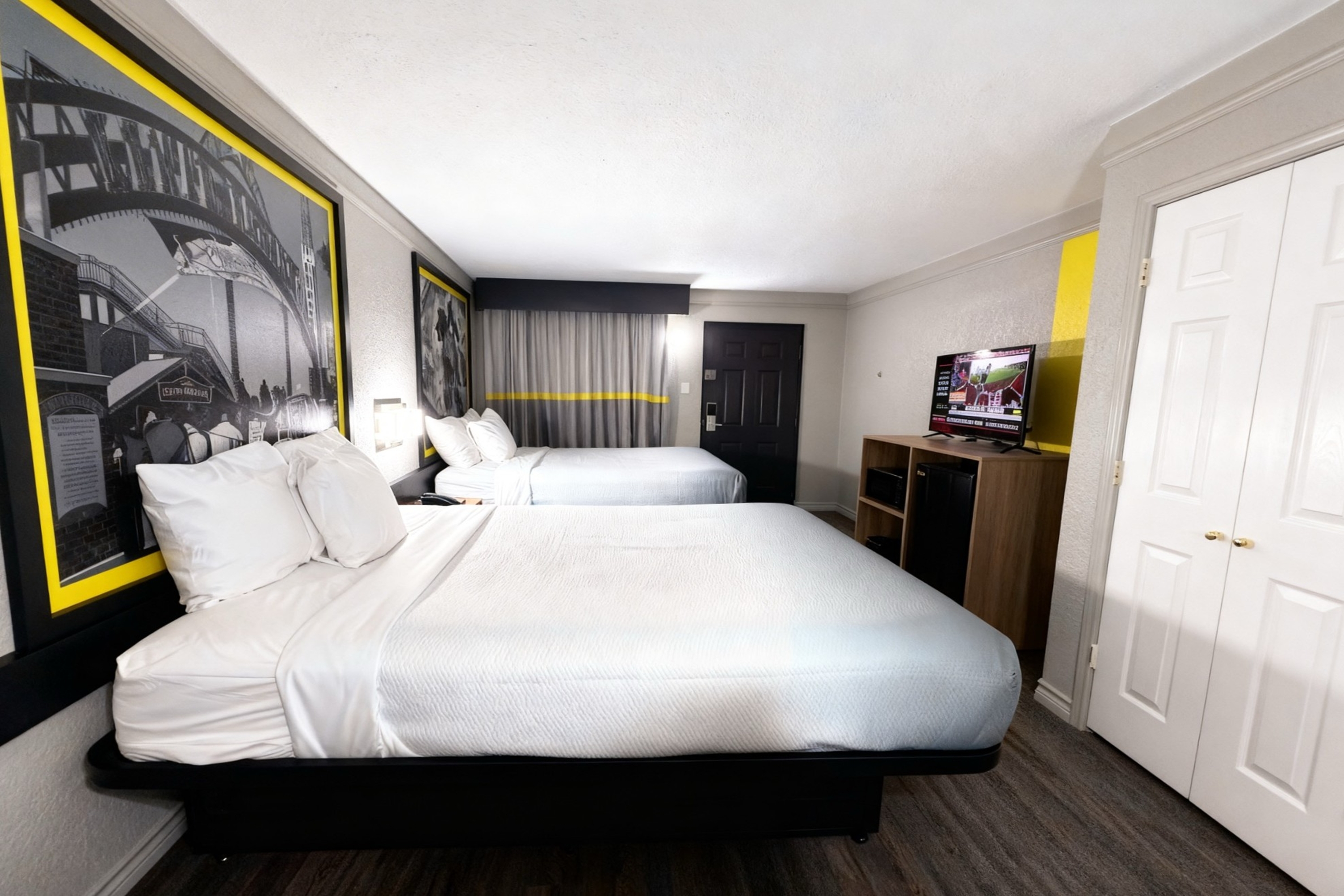 Guest room at the Super 8 by Wyndham Nacogdoches Near University in Nacogdoches, Texas