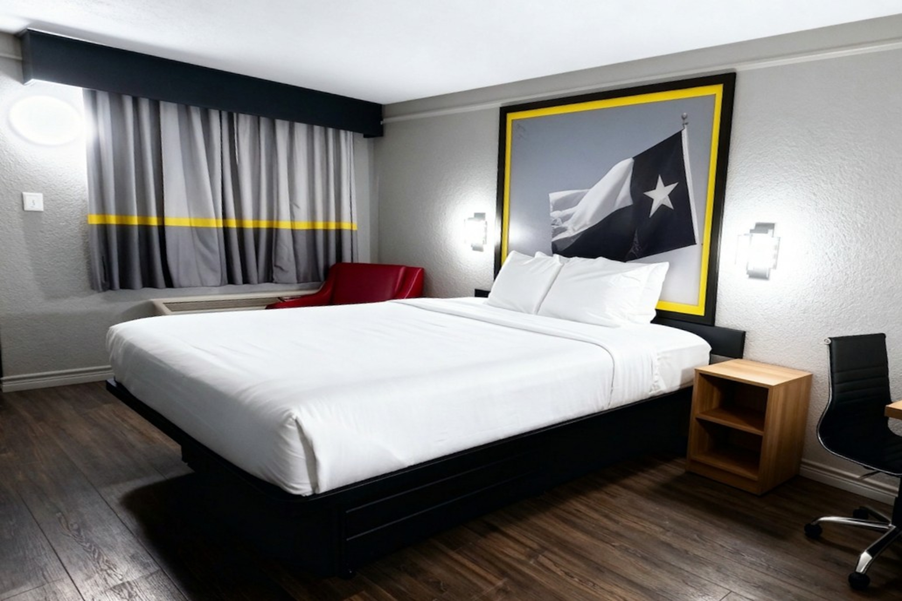Guest room at the Super 8 by Wyndham Nacogdoches Near University in Nacogdoches, Texas