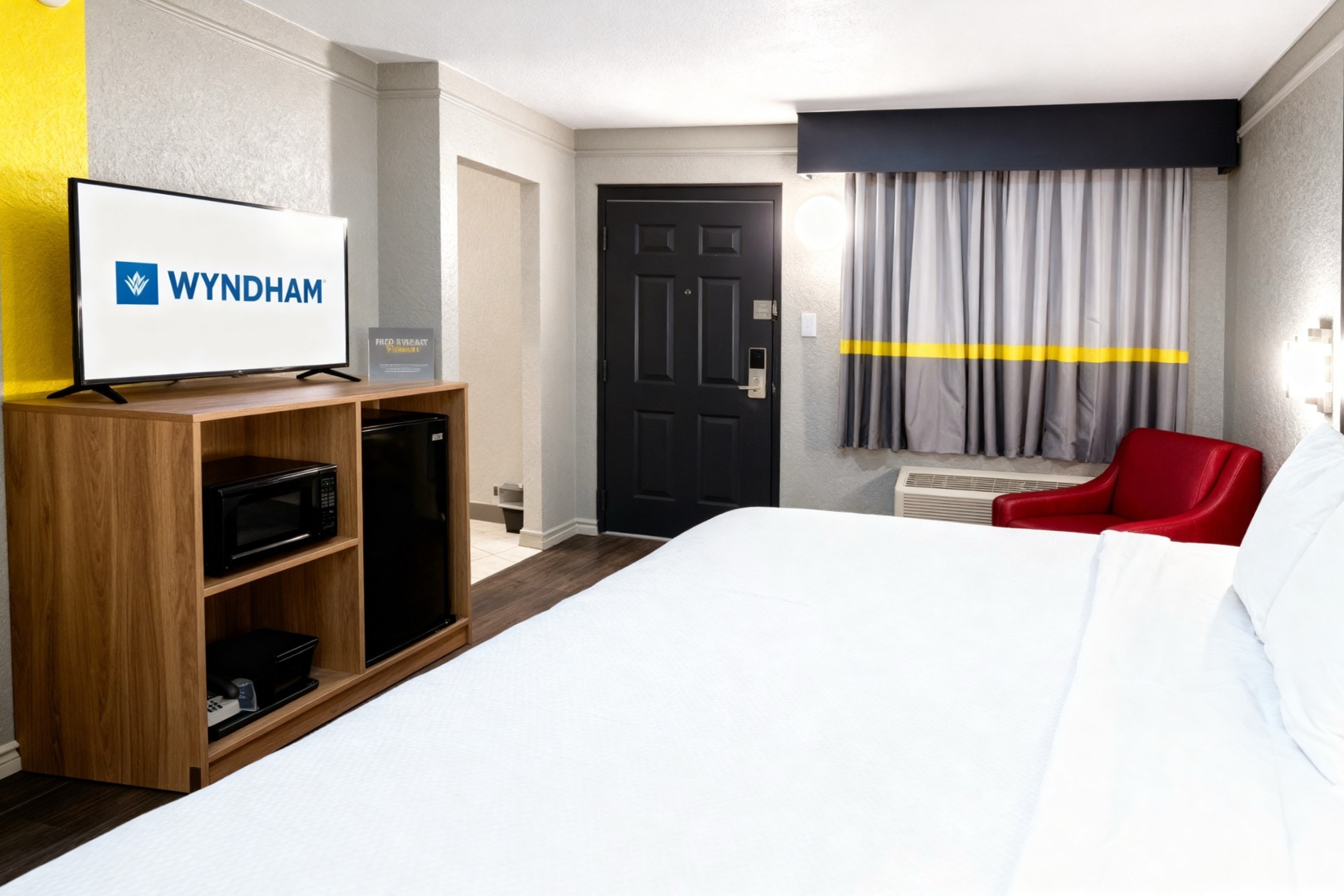 Guest room at the Super 8 by Wyndham Nacogdoches Near University in Nacogdoches, Texas
