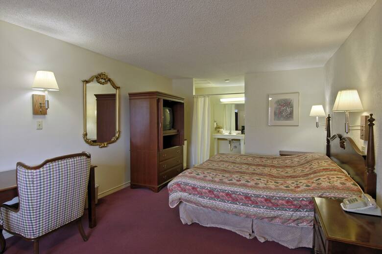 Guest room at the Super 8 Navasota in Navasota, Texas