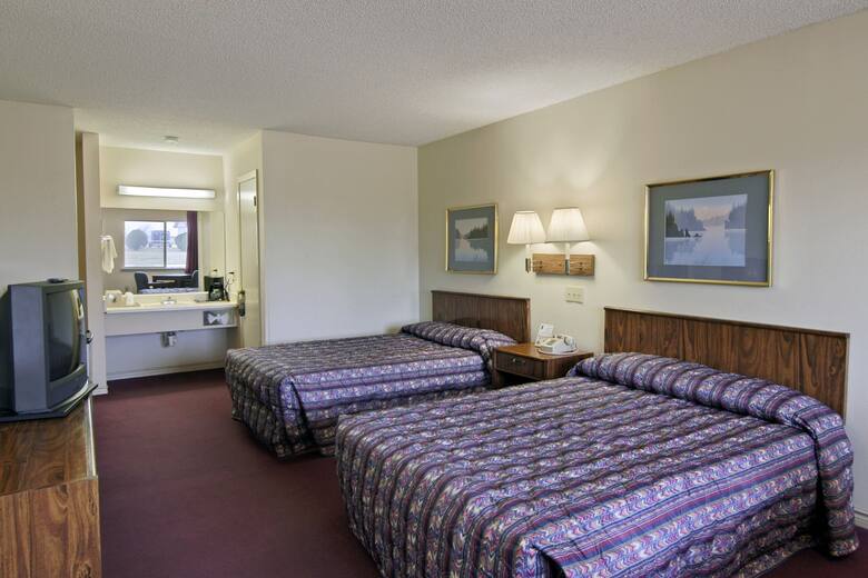 Guest room at the Super 8 Navasota in Navasota, Texas