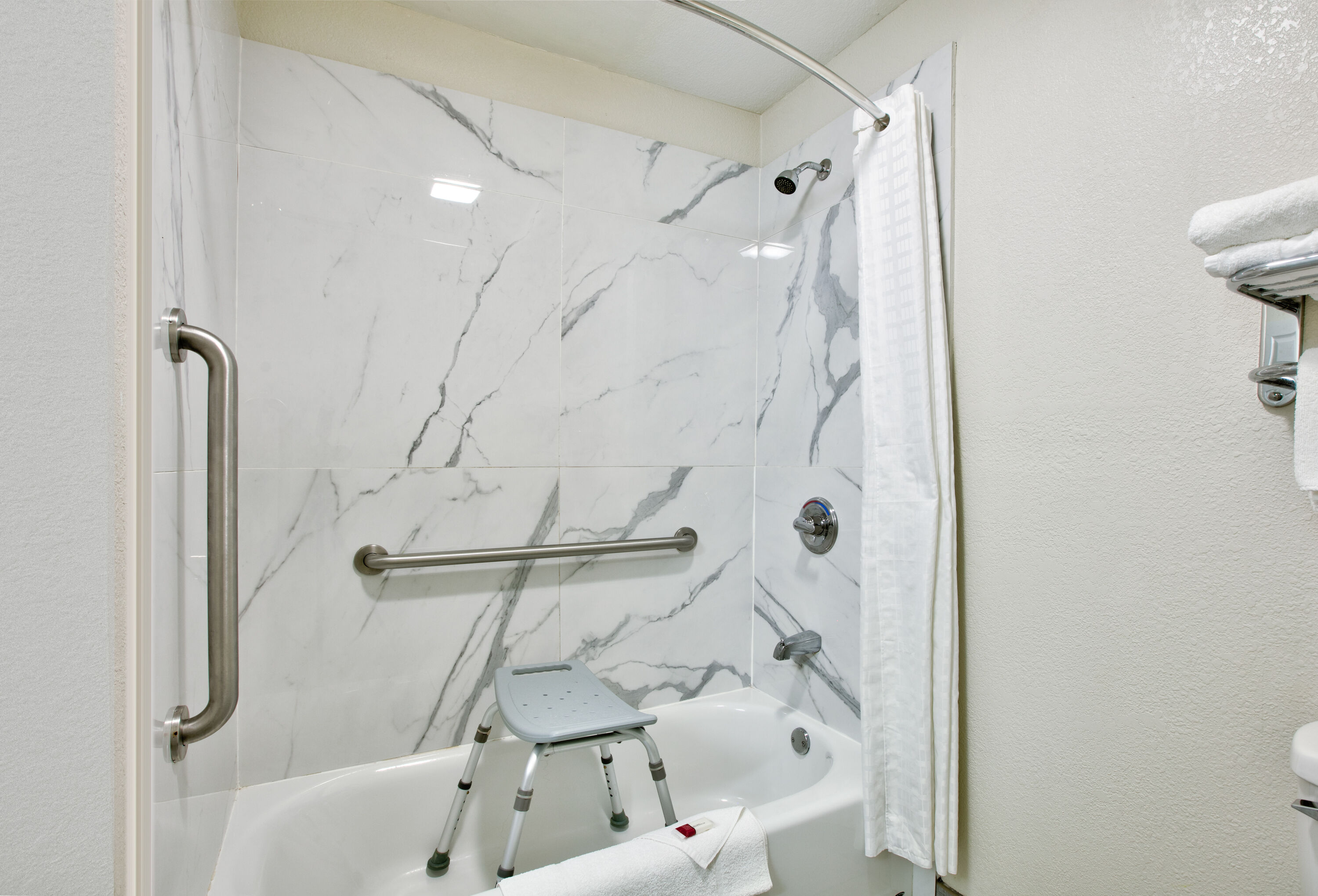 Guest room bath at the Super 8 by Wyndham Palestine TX in Palestine, Texas