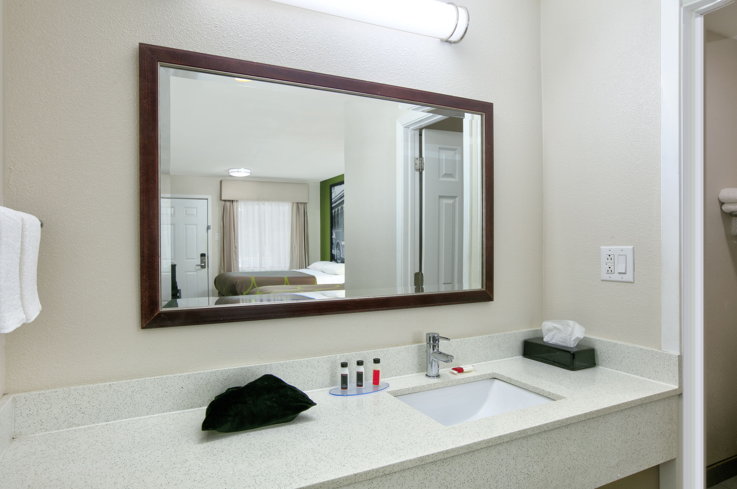 Guest room bath at the Super 8 by Wyndham Palestine TX in Palestine, Texas