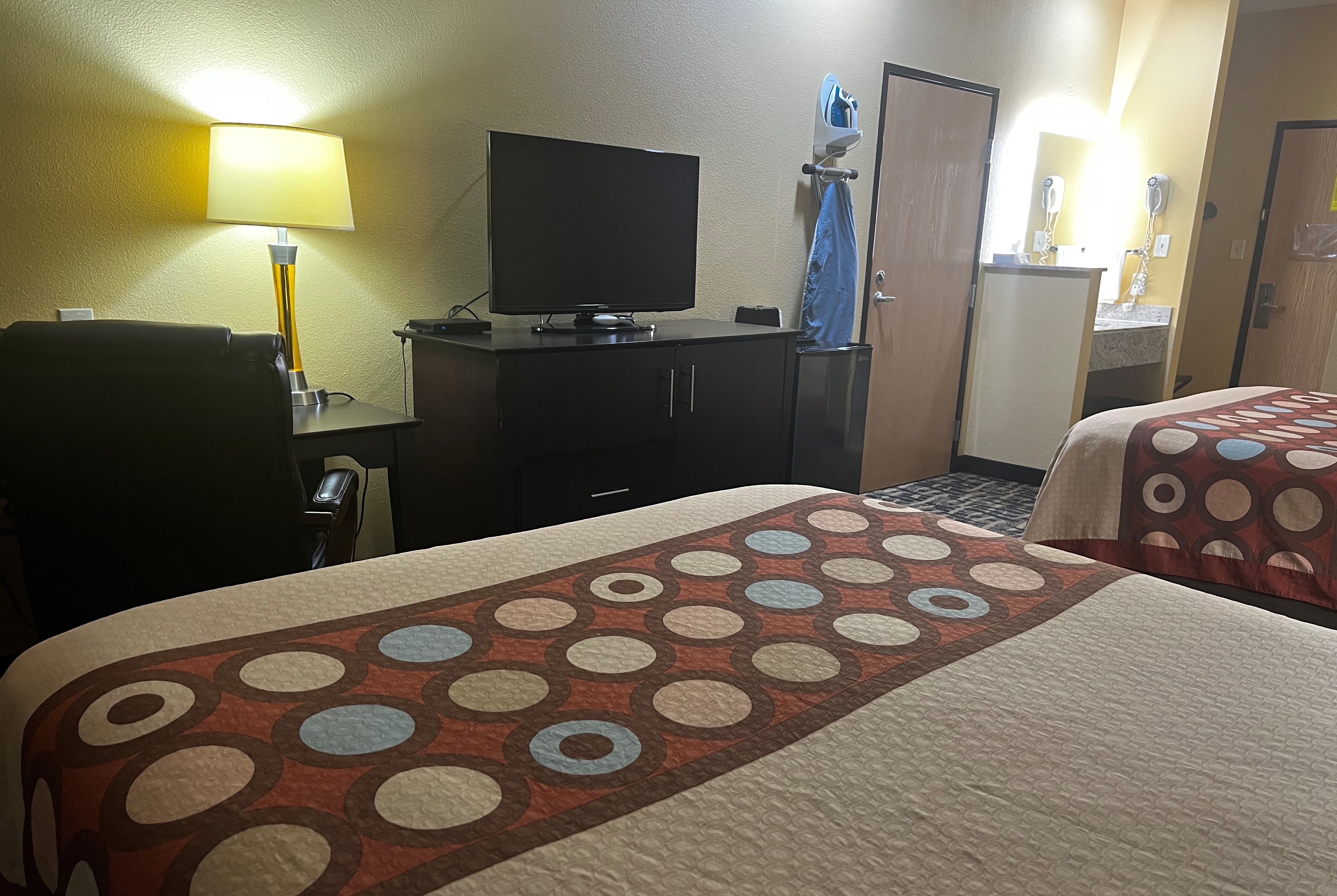 Guest room at the Super 8 by Wyndham Pasadena in Pasadena, Texas
