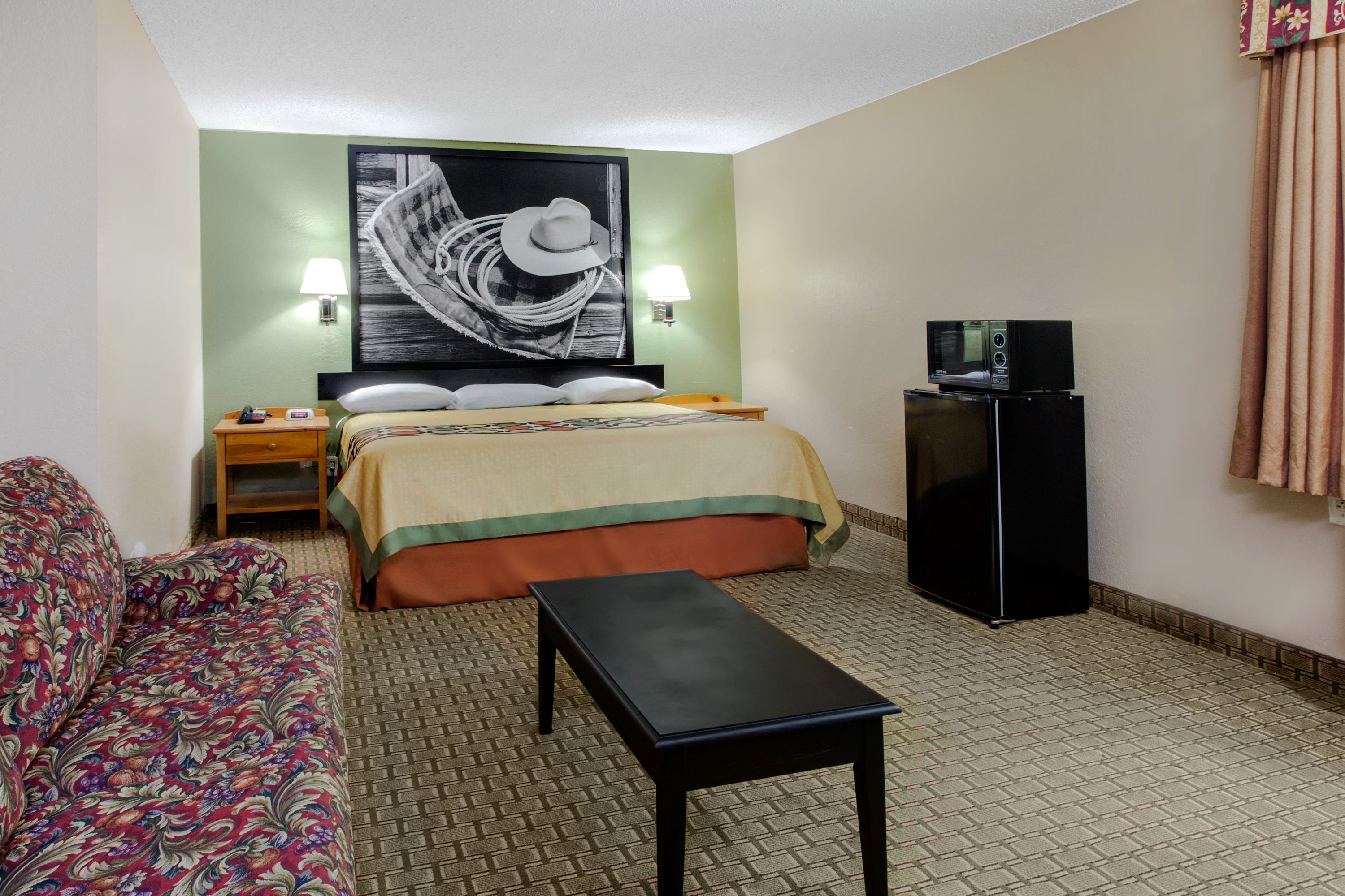 Guest room at the Super 8 by Wyndham Sherman in Sherman, Texas