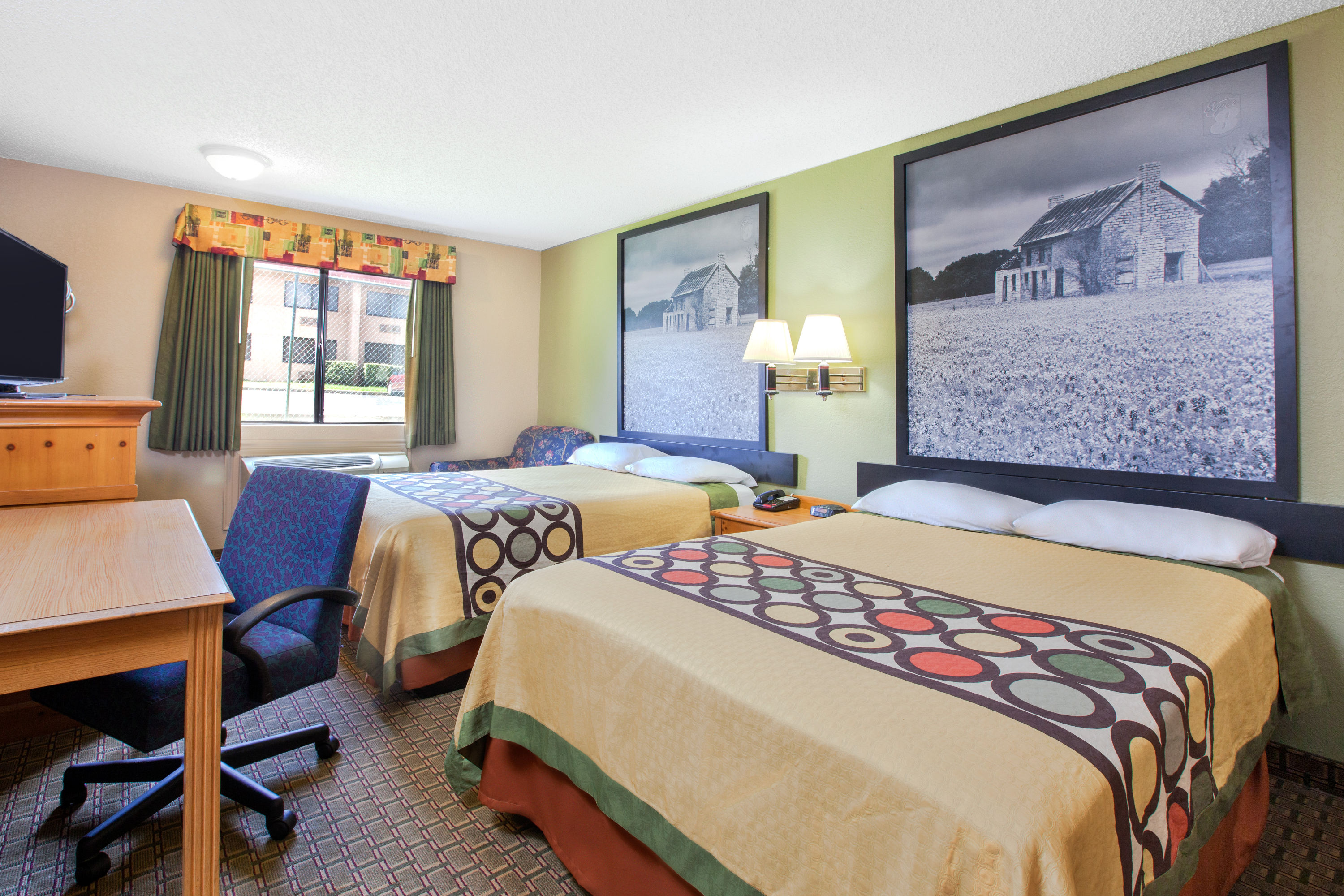 Guest room at the Super 8 by Wyndham Sherman in Sherman, Texas