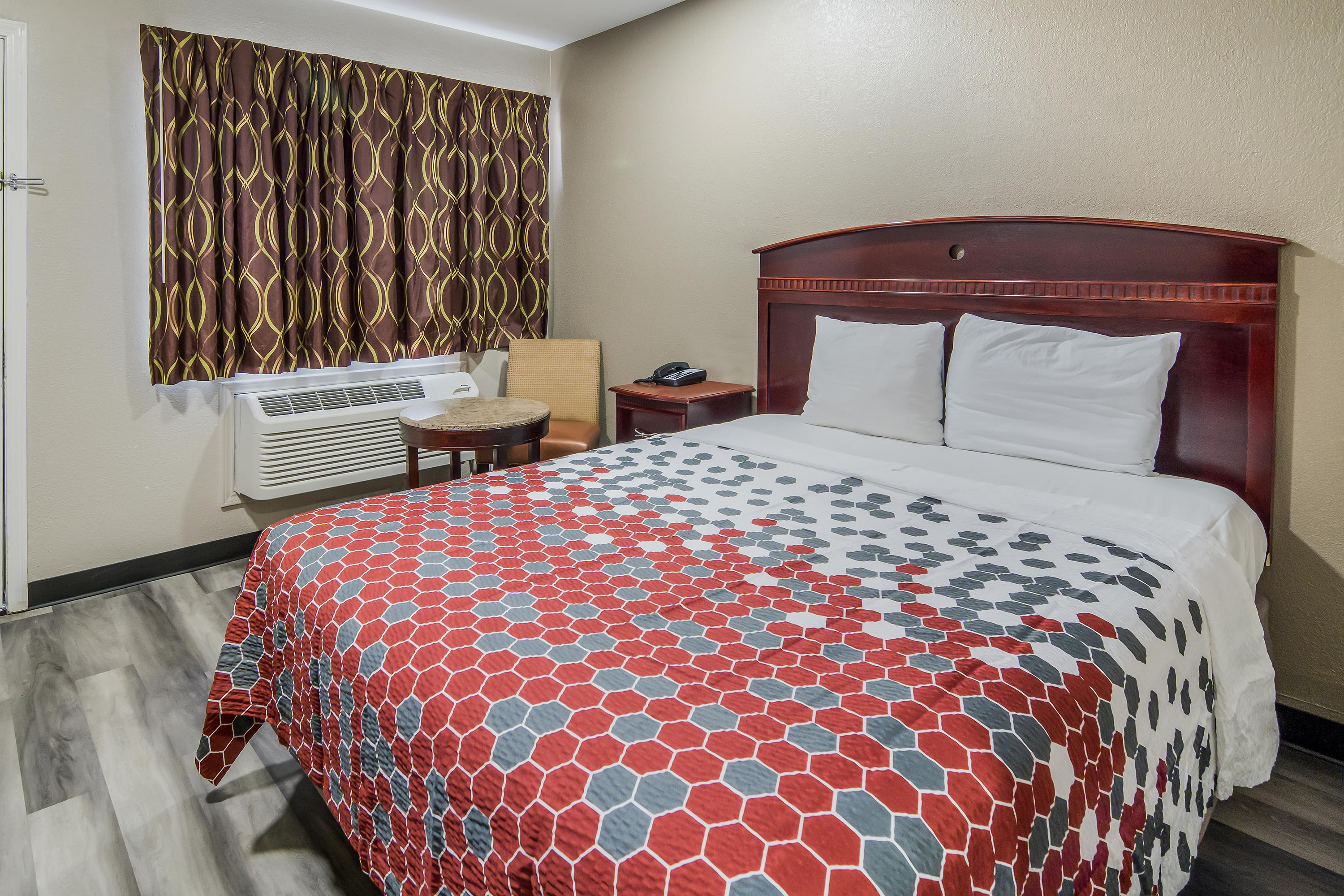 Guest room at the Super 8 by Wyndham Waco North I-35 in Waco, Texas