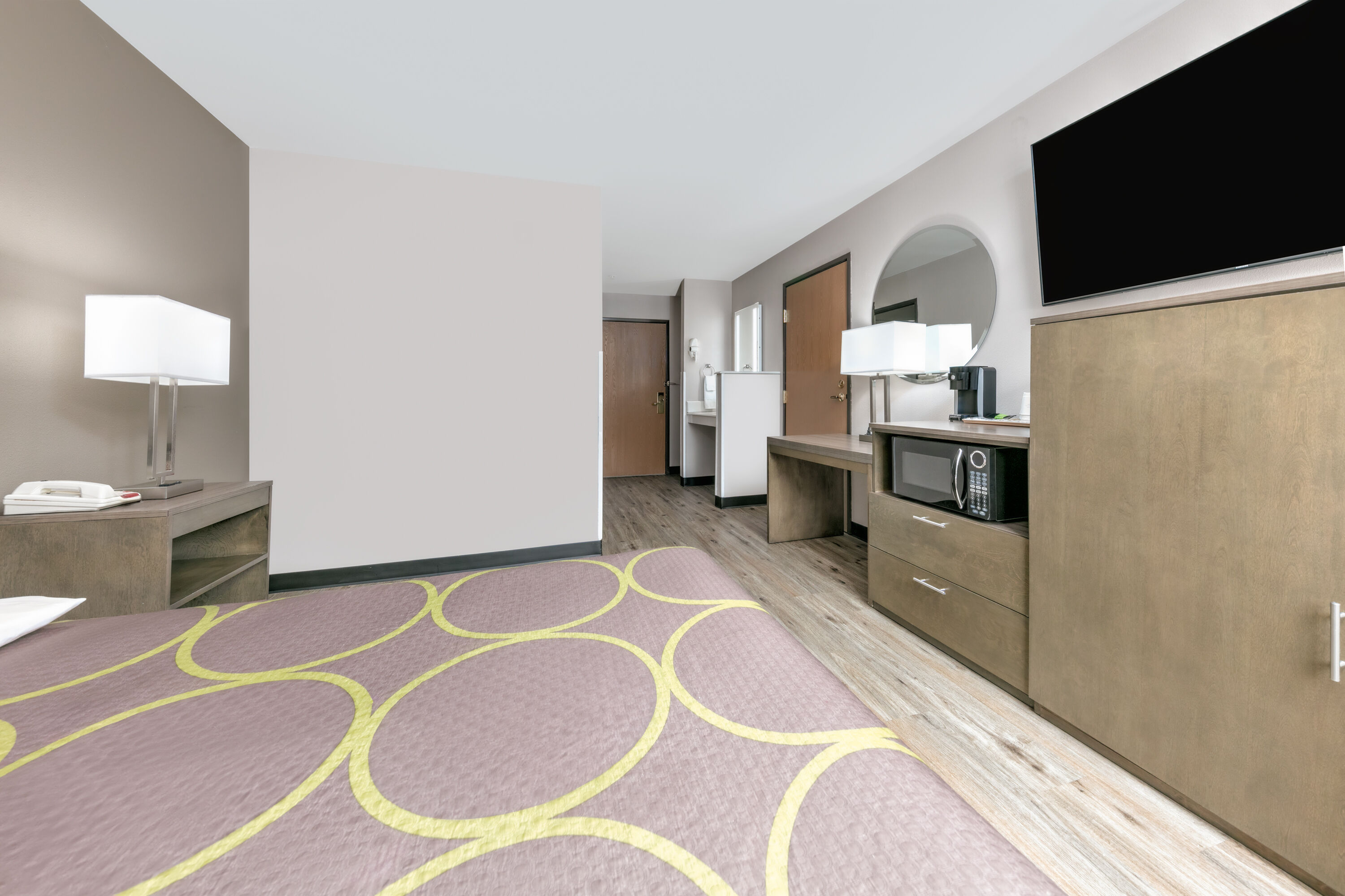 Guest room at the Super 8 by Wyndham Waxahachie TX in Waxahachie, Texas